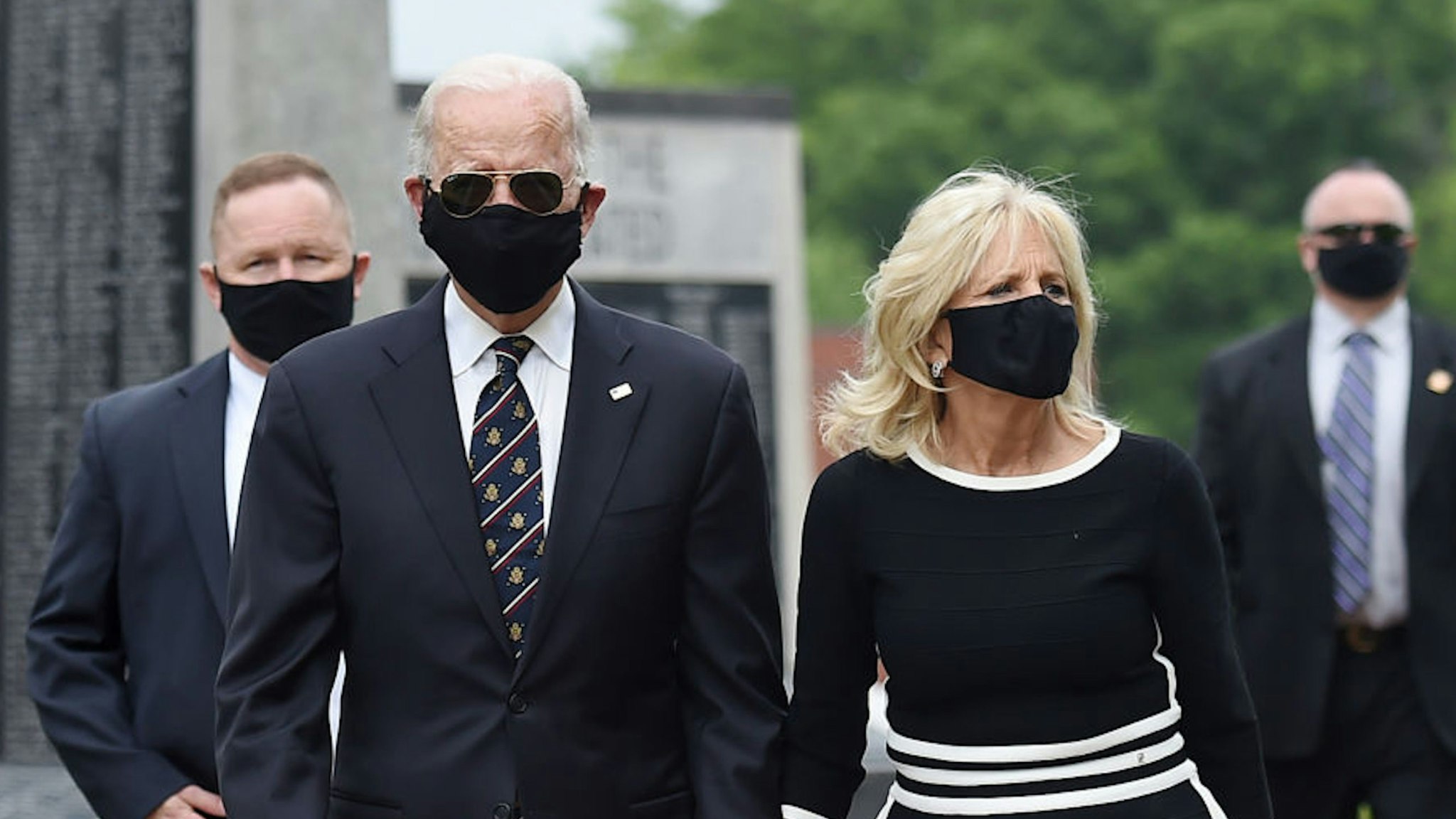 Democratic presidential candidate and former US Vice President Joe Biden and his wife Jill Biden, leave Delaware Memorial Bridge Veteran's Memorial Park after paying their respects to fallen service members in Newcastle, Delaware, May 25, 2020.