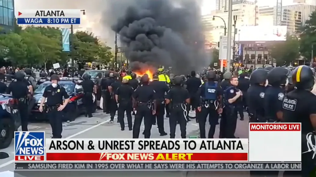 Large Scale Protests Erupt At CNN’s Atlanta Headquarters, Fires Set