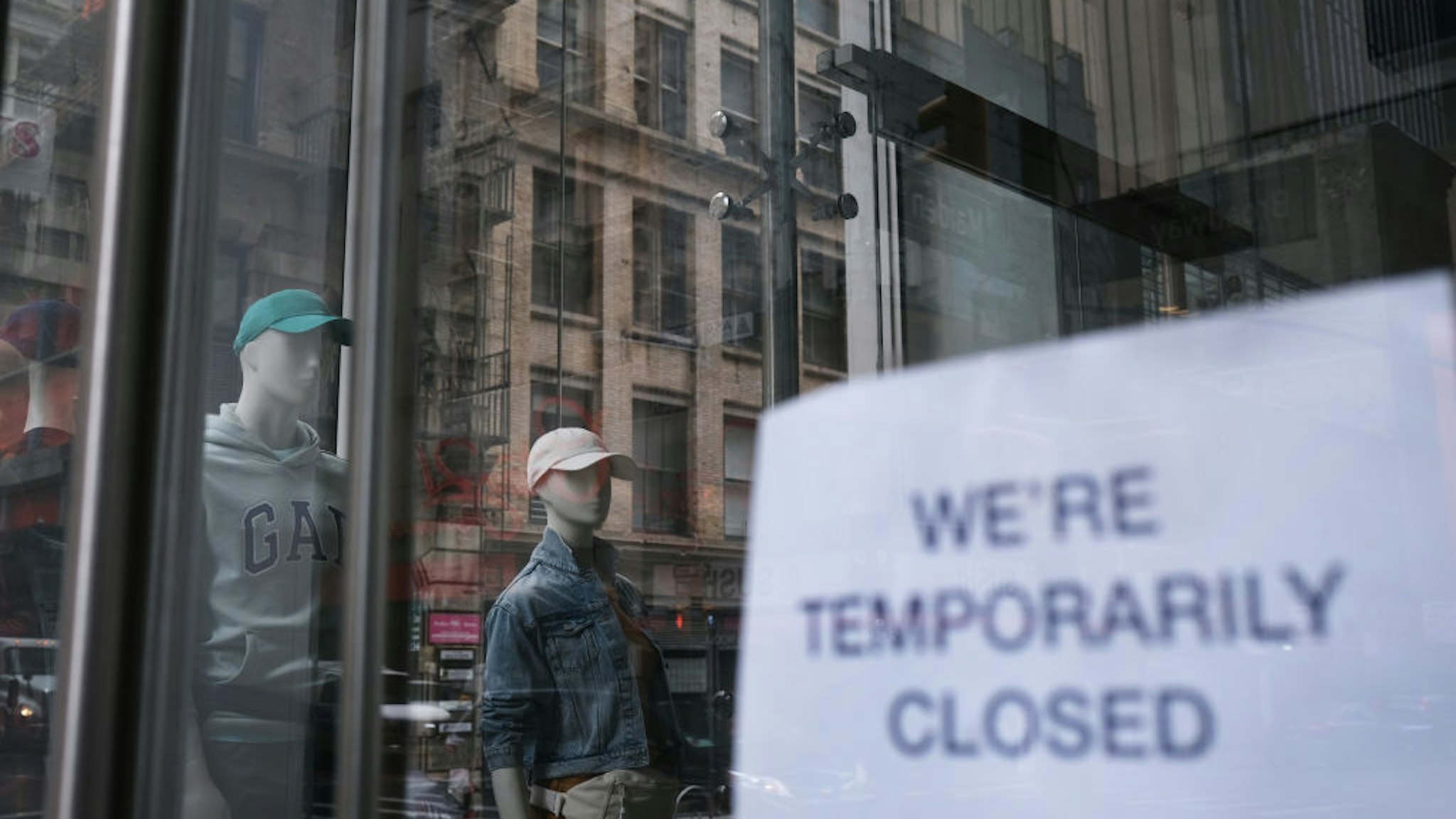 NEW YORK, NY - MAY 08: A store stands closed near Wall Street as the coronavirus keeps financial markets and businesses mostly closed on May 08, 2020 in New York City. The Bureau of Labor Statistics announced on Friday that the US economy lost 20.5 million jobs in April. This is the largest decline in jobs since the government began tracking the data in 1939. (Spencer Platt/Getty Images)
