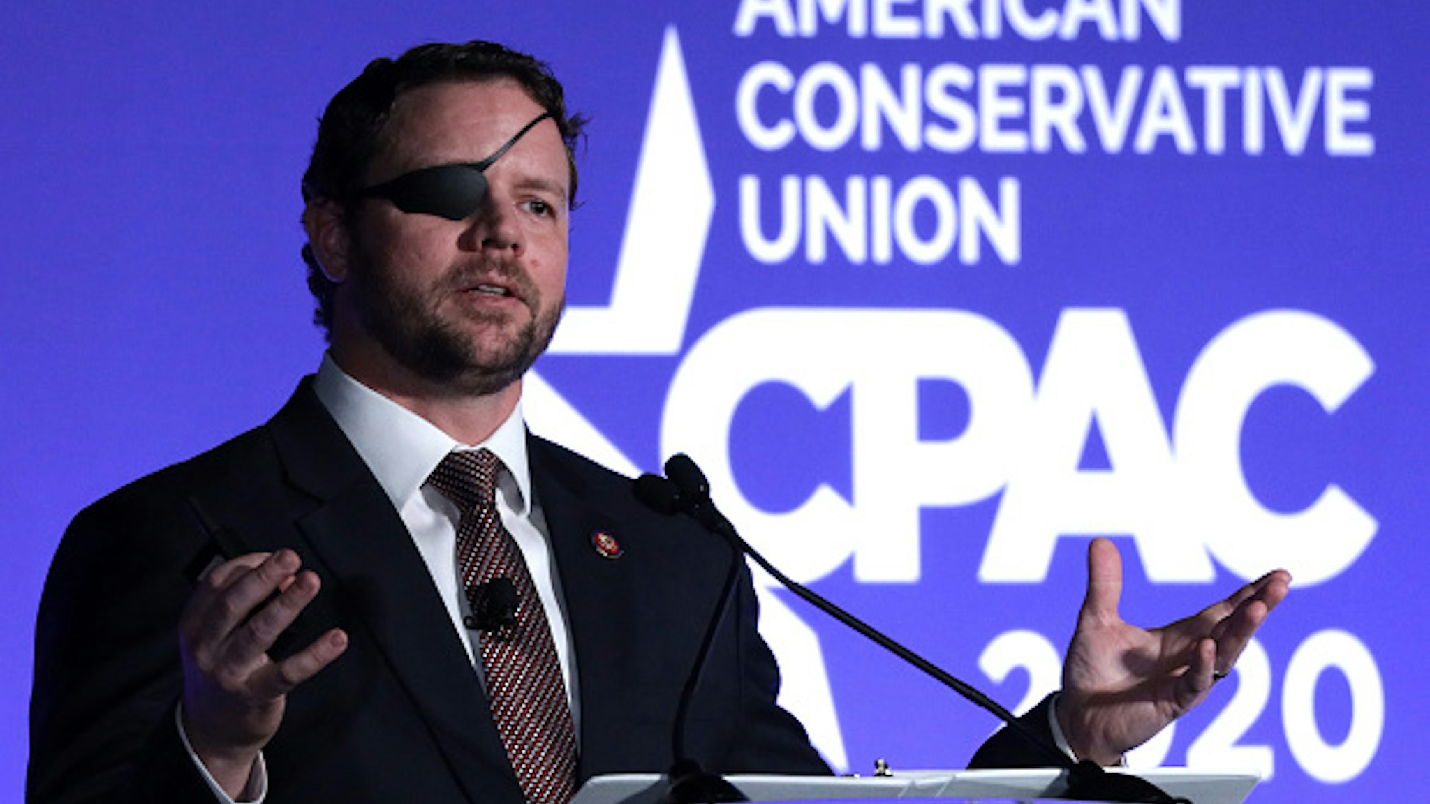 NATIONAL HARBOR, MARYLAND - FEBRUARY 26: U.S. Rep. Dan Crenshaw (R-TX) speaks on “The Fate of Our Culture and Our Nation Hangs in the Balance” during the CPAC Direct Action Training at the annual Conservative Political Action Conference at Gaylord National Resort &amp; Convention Center February 26, 2020 in National Harbor, Maryland. U.S. President Donald Trump is expected to address the annual event on February 29th.