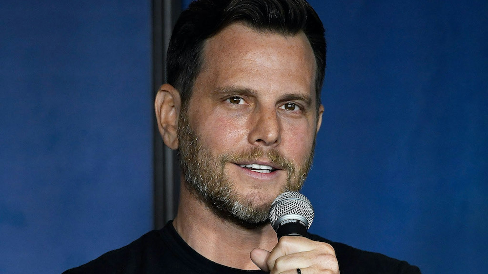 Politcal commentator, comedian and television personality Dave Rubin performs during his appearance at The Ice House Comedy Club on March 8, 2019 in Pasadena, California. (Photo by Michael S. Schwartz/Getty Images)