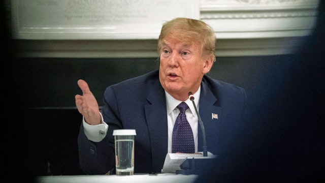 President Donald Trump reveales that he is taking Hydroxychloroquine prophylaxis against COVID-19 as he participates in a roundtable with Restaurant Executives and Industry Leaders in the State Dining Room, Monday, May 18, 2020. ( Photo by Doug Mills/The New York Times)
