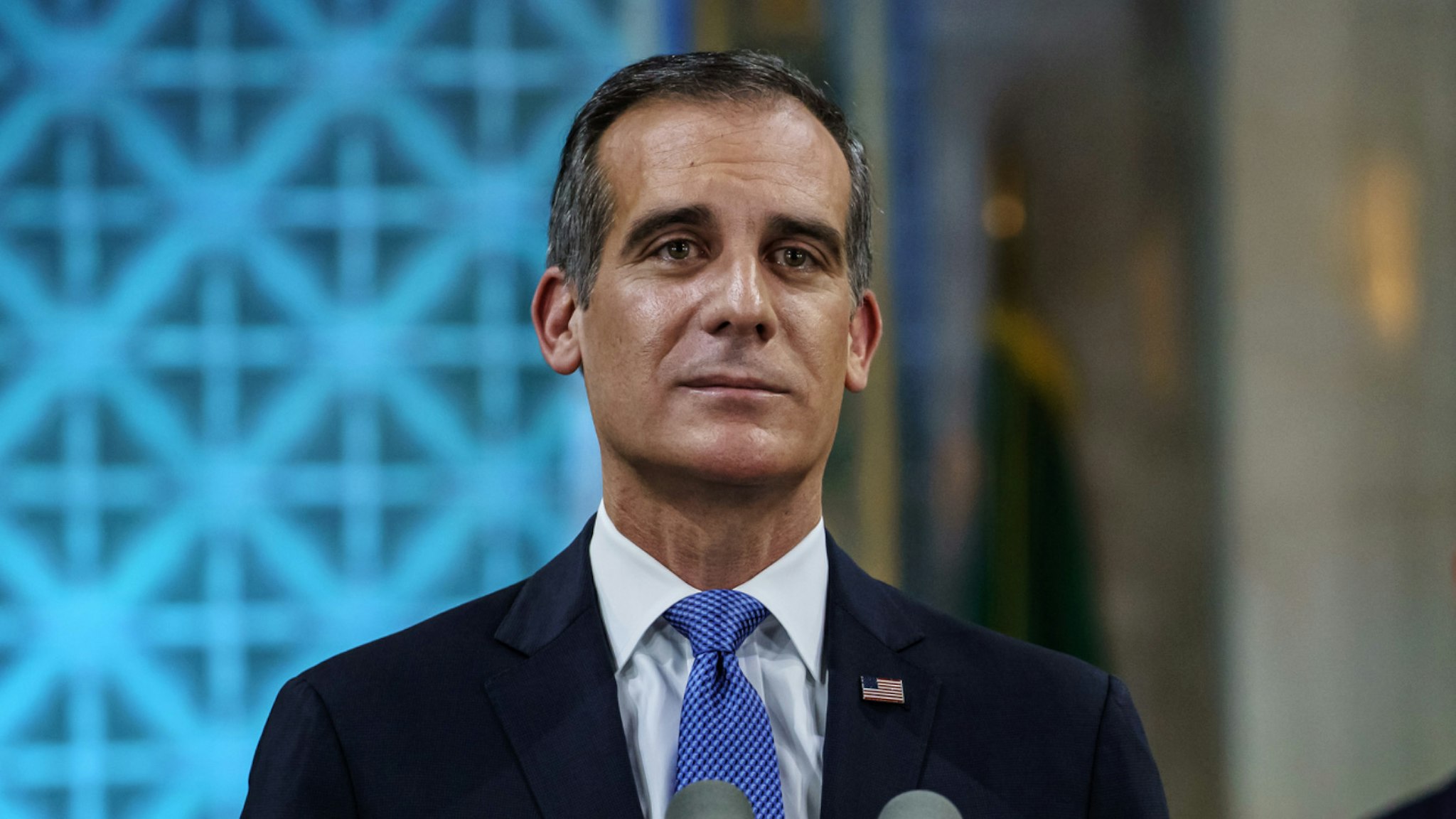 Los Angeles Mayor Eric Garcetti tears up as he gives his annual 'State of the City' speech at City Hall in Los Angeles, Calif., on April 19, 2020.