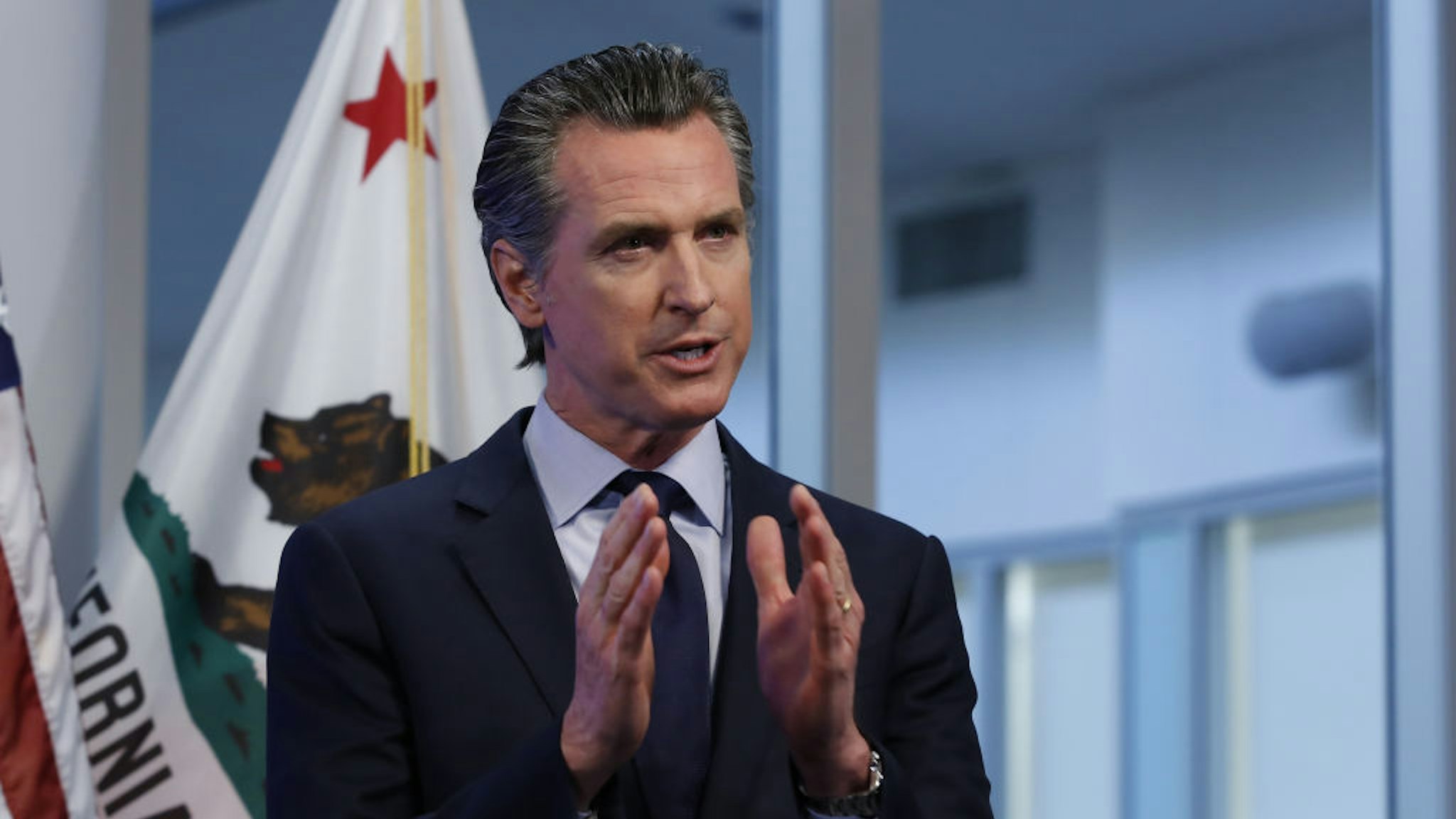 Gavin Newsom, governor of California, speaks during a news conference in Sacramento, California, U.S., on Tuesday, April 14, 2020. Newsom outlined his plan to lift restrictions in the most-populous U.S. state, saying a reopening depends on meeting a series of benchmarks that would remake daily life for 40 million residents. Photographer: Rich Pedroncelli/AP/Bloomberg