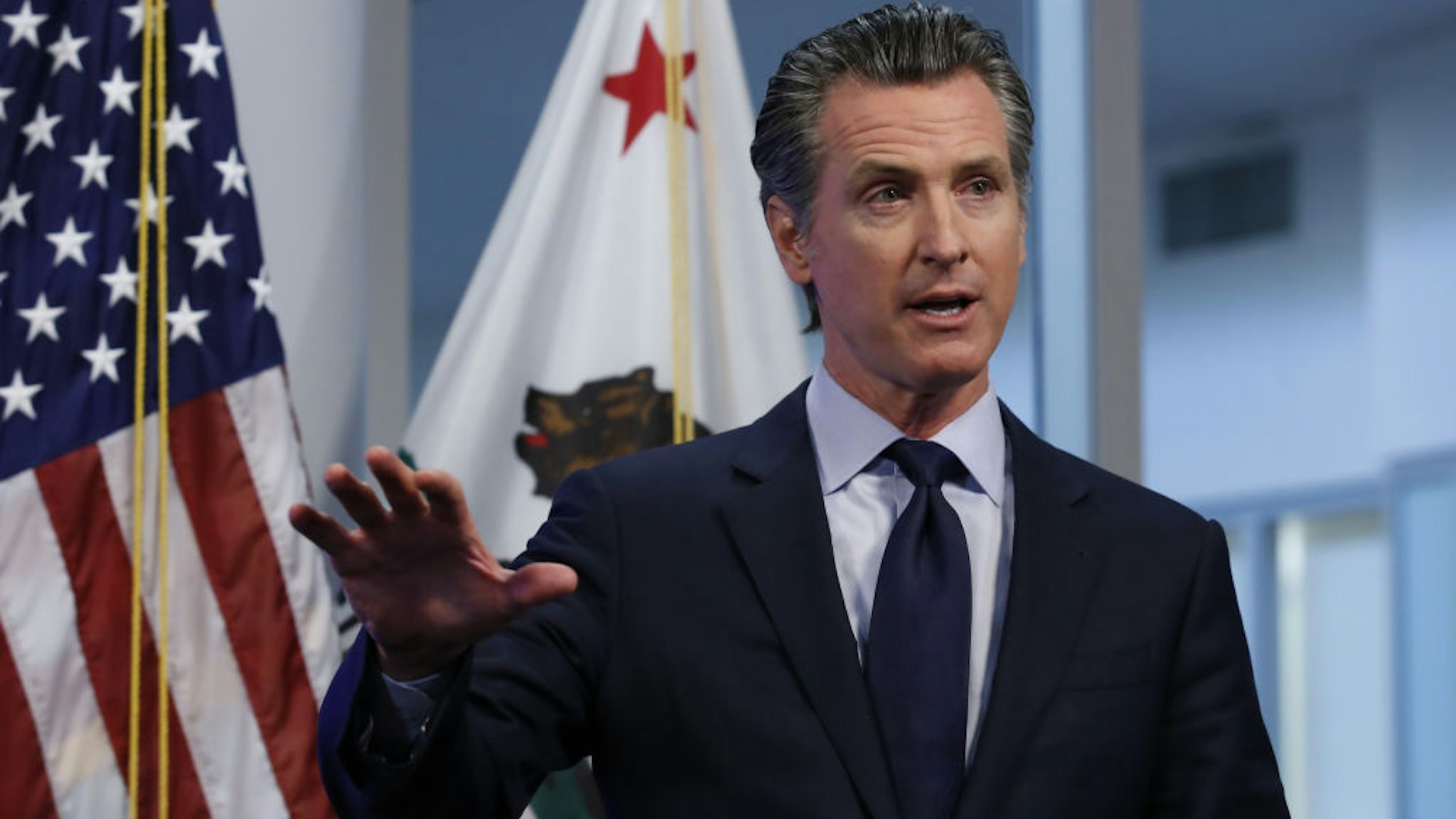 Gavin Newsom, governor of California, speaks during a news conference in Sacramento, California, U.S., on Tuesday, April 14, 2020. Newsom outlined his plan to lift restrictions in the most-populous U.S. state, saying a reopening depends on meeting a series of benchmarks that would remake daily life for 40 million residents. Photographer: Rich Pedroncelli/AP/Bloomberg via Getty Images