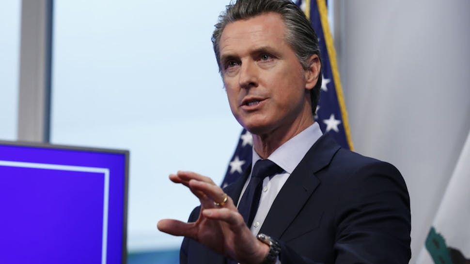 Governor Gavin Newsom Holds Coronavirus Briefing Gavin Newsom, governor of California, speaks during a news conference in Sacramento, California, U.S., on Tuesday, April 14, 2020. Newsom outlined his plan to lift restrictions in the most-populous U.S. state, saying a reopening depends on meeting a series of benchmarks that would remake daily life for 40 million residents.
