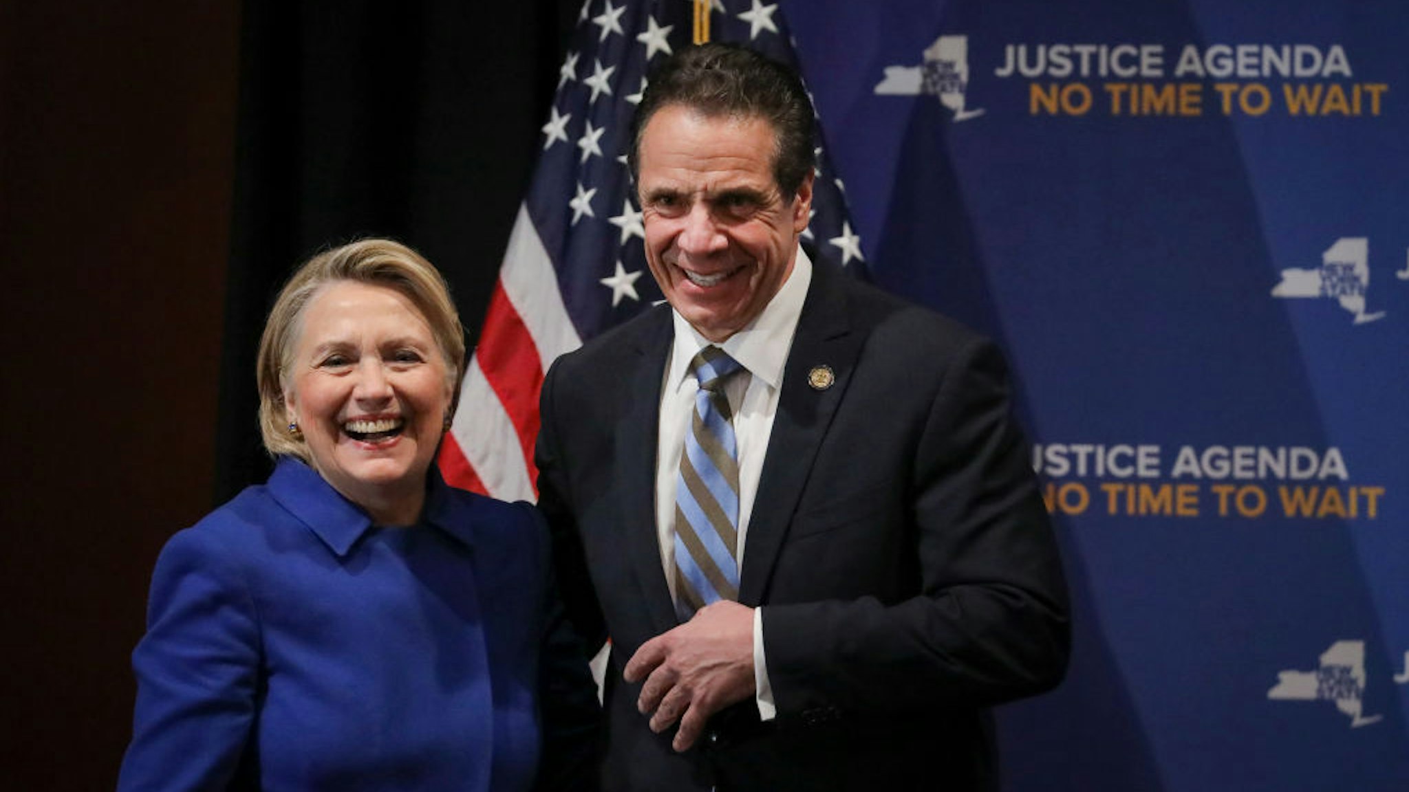 Former Secretary of State Hillary Clinton and New York Governor Andrew Cuomo smile at the end of an event to discuss reproductive rights at Barnard College, January 7, 2019 in New York City.