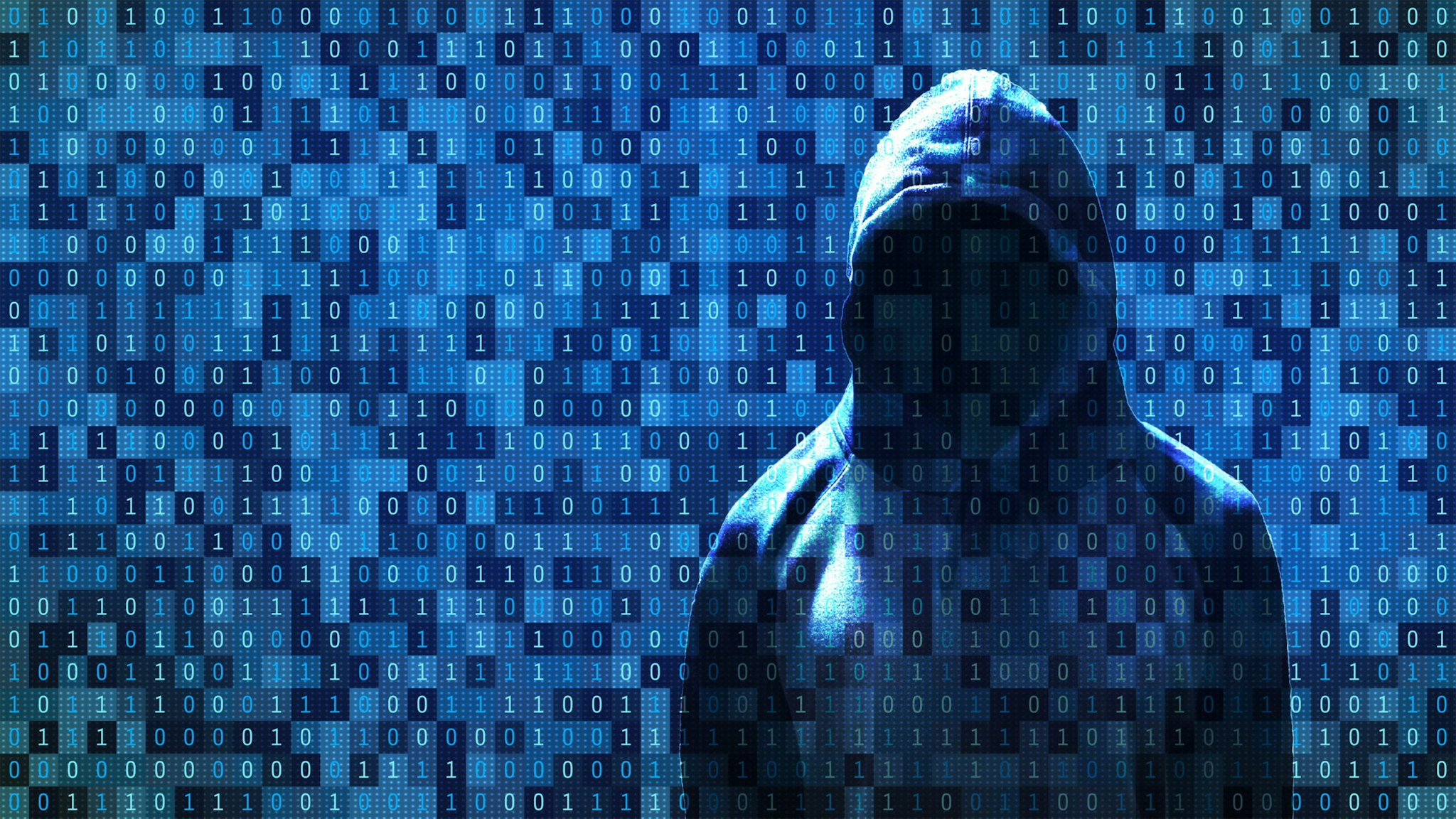 Hacker standing in front of 01 or binary numbers on the computer screen on monitor background matrix, Digital data code in safety security technology concept. Anonymous