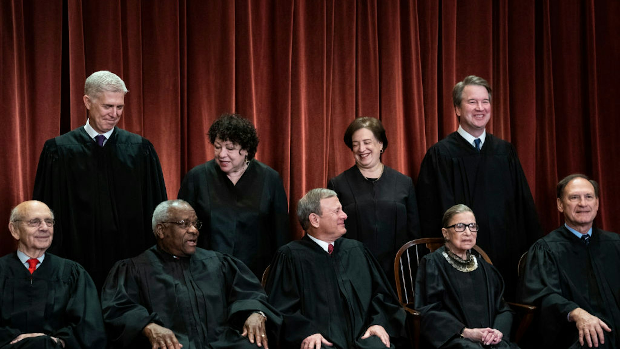 Justices of the United States Supreme Court sit for their official group photo at the Supreme Court on Friday, Nov. 30, 2018 in Washington, DC.