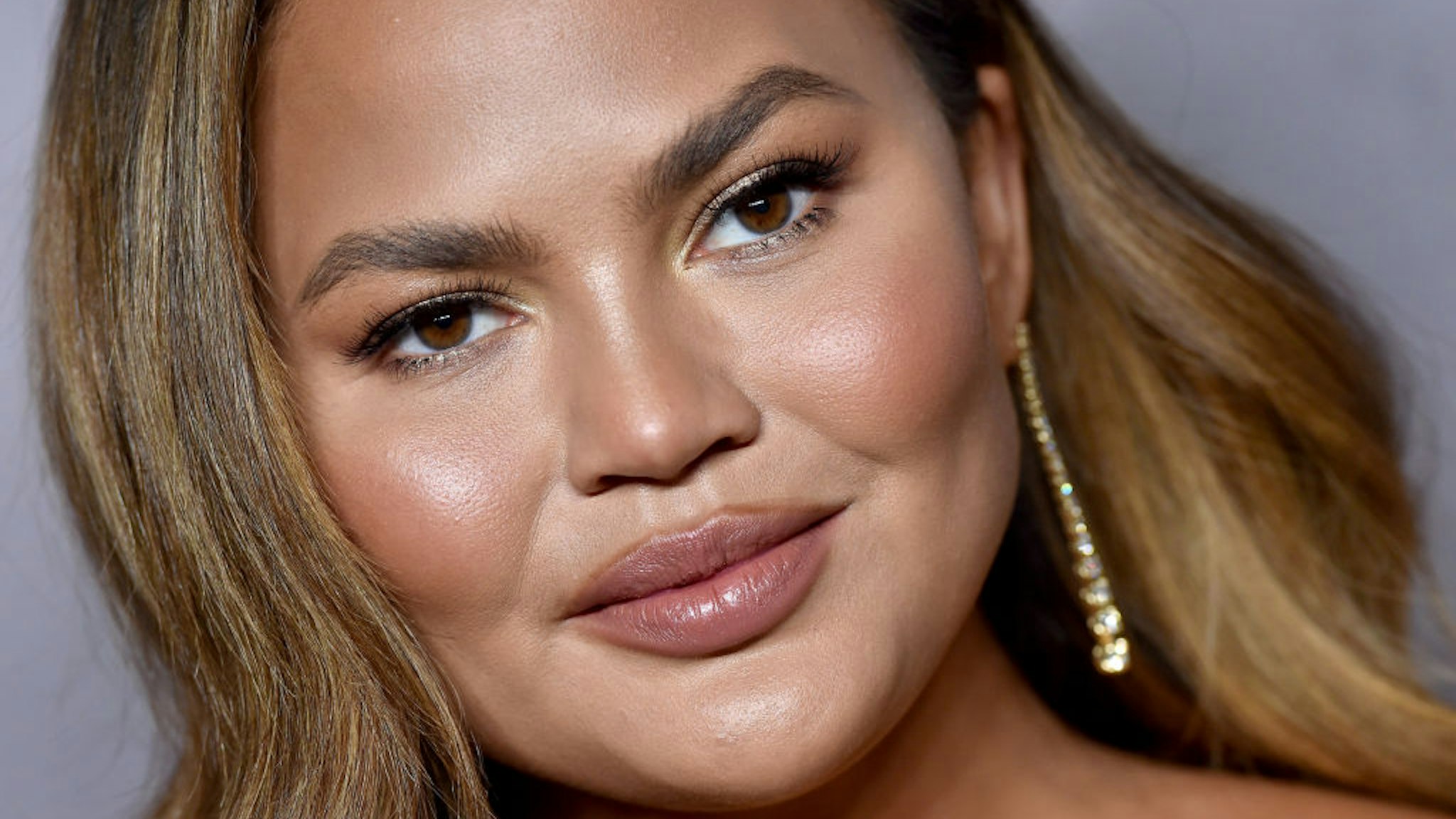 Chrissy Teigen attends the 2019 Baby2Baby Gala Presented By Paul Mitchell at 3LABS on November 09, 2019 in Culver City, California.