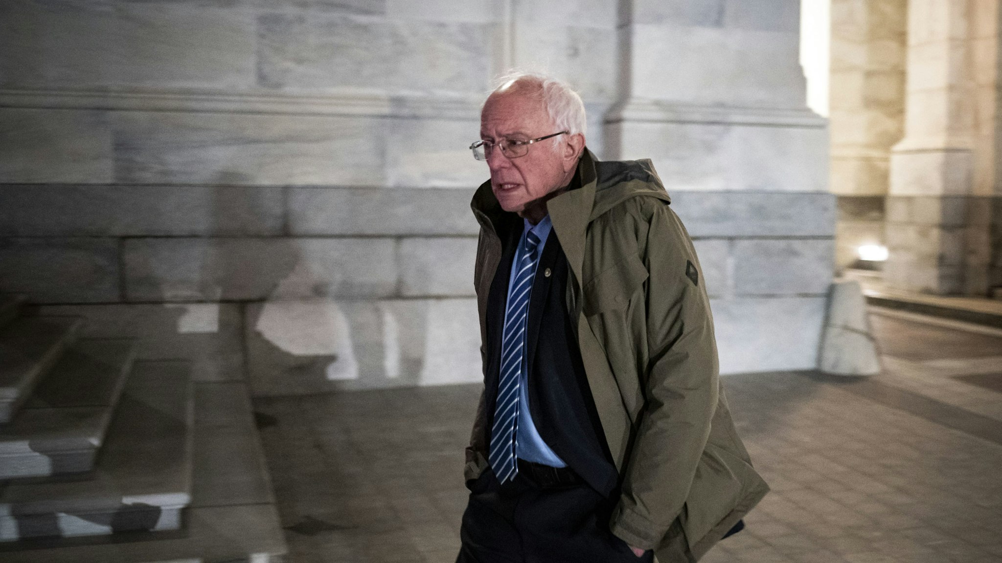 Senator Bernie Sanders, an Independent from Vermont and 2020 presidential candidate, departs the U.S. Capitol following a vote in Washington, D.C., U.S., on Wednesday, March 25, 2020. The U.S. Senate approved a historic $2 trillion rescue plan to respond to the economic and health crisis caused by the coronavirus pandemic, putting pressure on the Democratic-led House to pass the bill quickly and send it to President Donald Trump for his signature. Photographer: Al Drago/Bloomberg via Getty Images