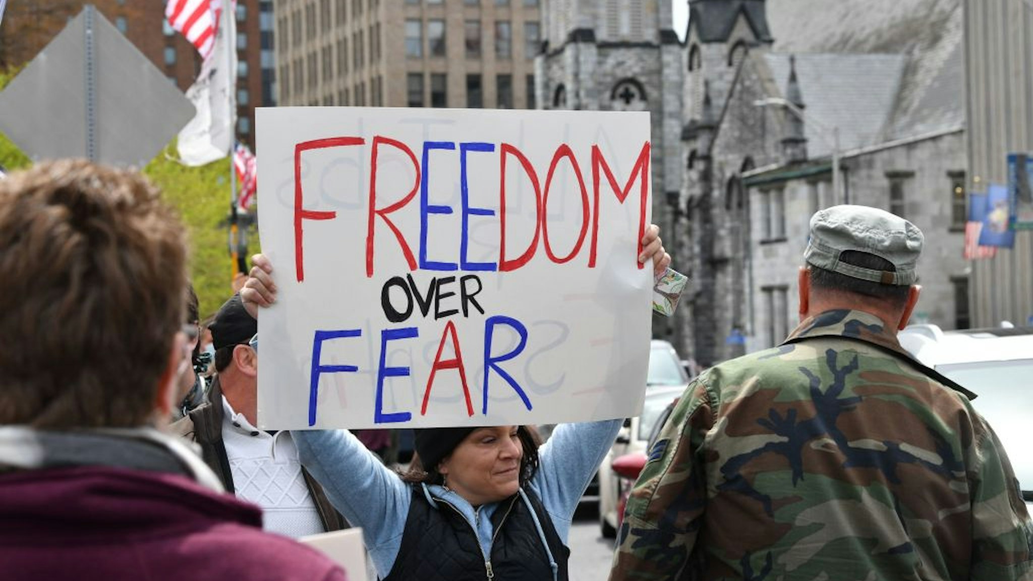 People take part in a "reopen" Pennsylvania demonstration on April 20, 2020 in Harrisburg, Pennsylvania.