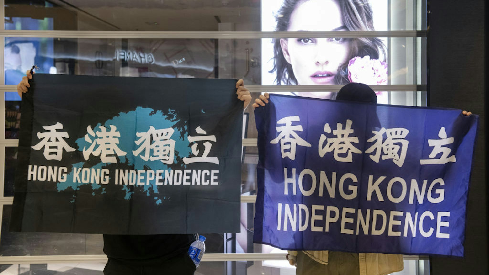 Protesters gathered at New Town Plaza shopping mall, in Hong Kong, China on May 1, 2020. As virus cases eased in Hong Kong, activities threated Government social-distancing restrictions with a new protest in Shatin which was quickly dispersed by hundreds of riot police officers.