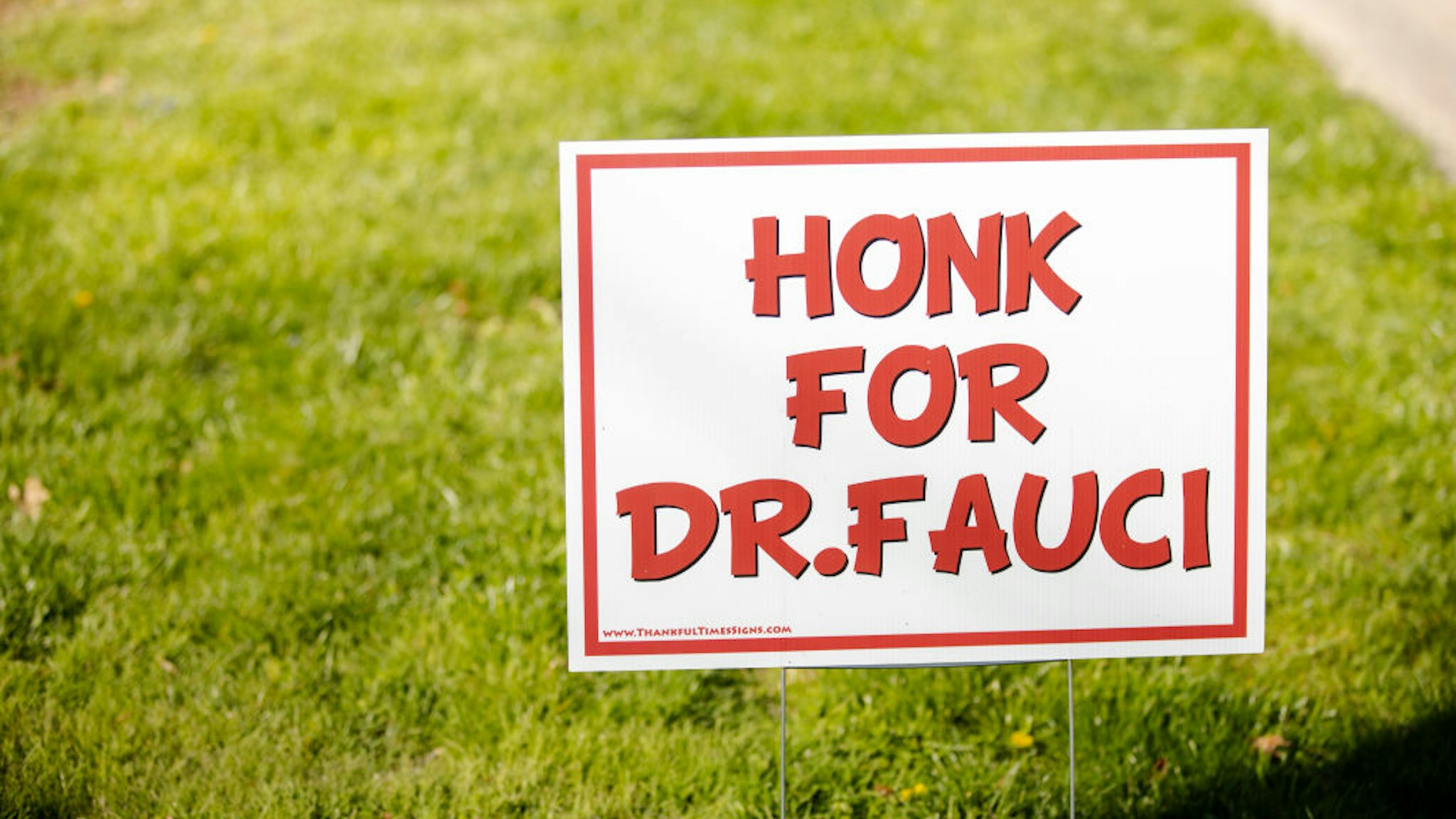 A sign on a lawn says, "Honk for Dr. Fauci" to show support for Dr. Anthony S. Fauci, M.D., director of the National Institute of Allergy and Infectious Diseases (NIAID).