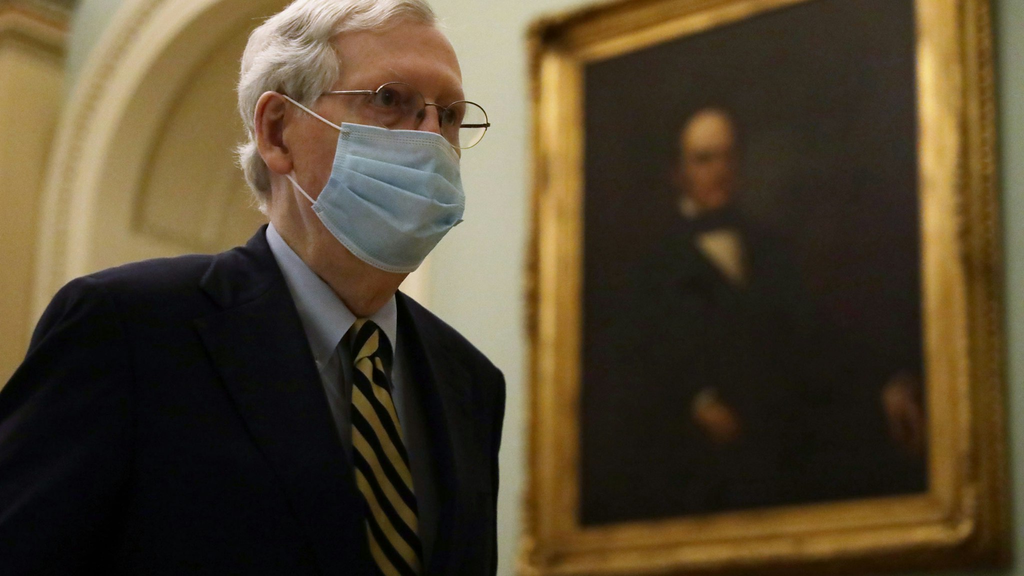 WASHINGTON, DC - MAY 11: U.S. Senate Majority Leader Sen. Mitch McConnell (R-KY) wears a mask as he walks through a hallway at the U.S. Capitol May 11, 2020 in Washington, DC. The Senate is back in session for the second week after a pause due to the COVID-19 outbreak. (Photo by Alex Wong/Getty Images)WASHINGTON, DC - MAY 11: U.S. Senate Majority Leader Sen. Mitch McConnell (R-KY) wears a mask as he walks through a hallway at the U.S. Capitol May 11, 2020 in Washington, DC. The Senate is back in session for the second week after a pause due to the COVID-19 outbreak. (Photo by Alex Wong/Getty Images)