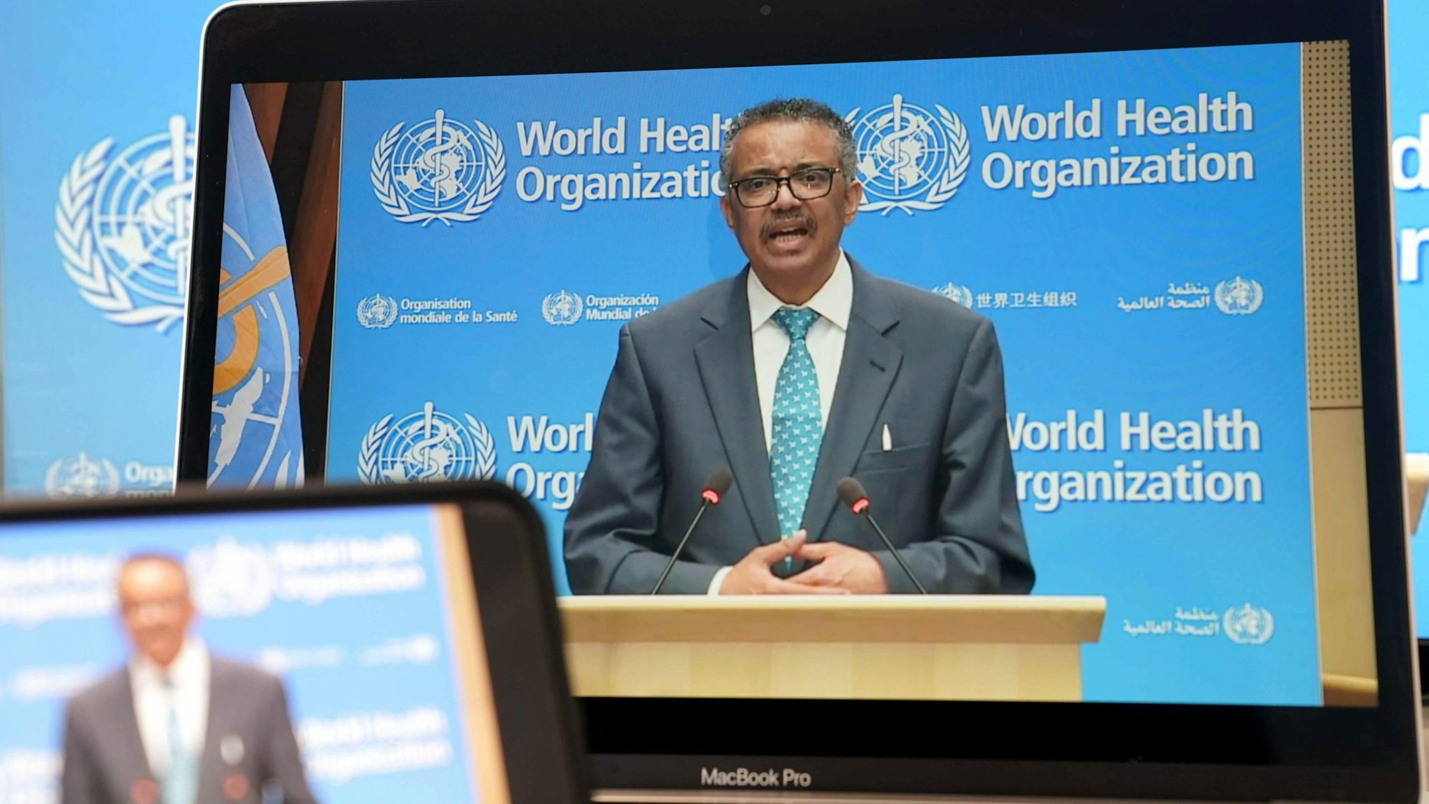 BERLIN, GERMANY - MAY 18: A screen of World Health Organization Director-General Tedros Adhanom Ghebreyesus speaking during the opening ceremony of the 73rd annual World Health Assemble via video conference on May 18, 2020 in Berlin, Germany. (Photo by Peng Dawei/China News Service via Getty Images)BERLIN, GERMANY - MAY 18: A screen of World Health Organization Director-General Tedros Adhanom Ghebreyesus speaking during the opening ceremony of the 73rd annual World Health Assemble via video conference on May 18, 2020 in Berlin, Germany. (Photo by Peng Dawei/China News Service via Getty Images)