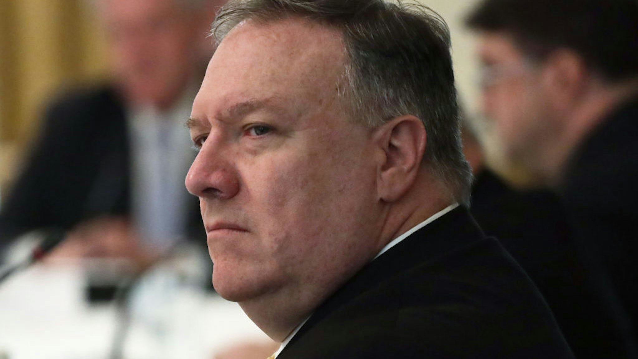 U.S. Secretary of State Mike Pompeo listens during a cabinet meeting in the East Room of the White House on May 19, 2020