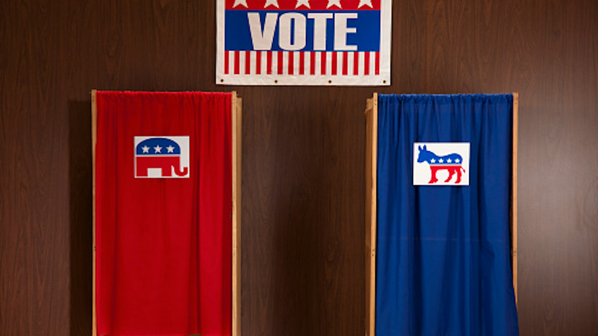 Voting booths in polling place - stock photo