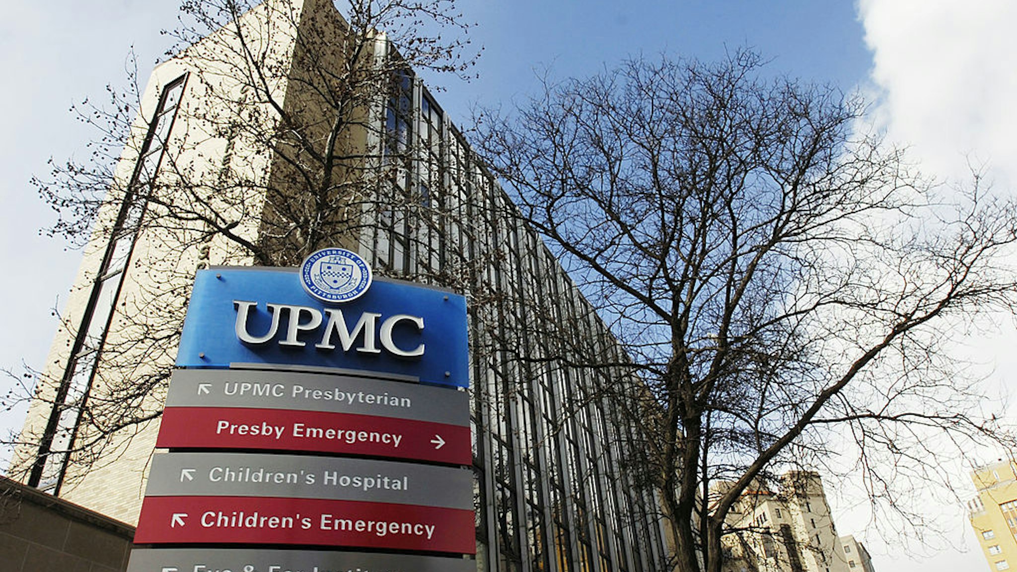 A sign points to areas on the University of Pittsburgh Medical Center campus in Pittsburgh, Pennsylvania, U.S., on Tuesday, Feb. 9, 2008.