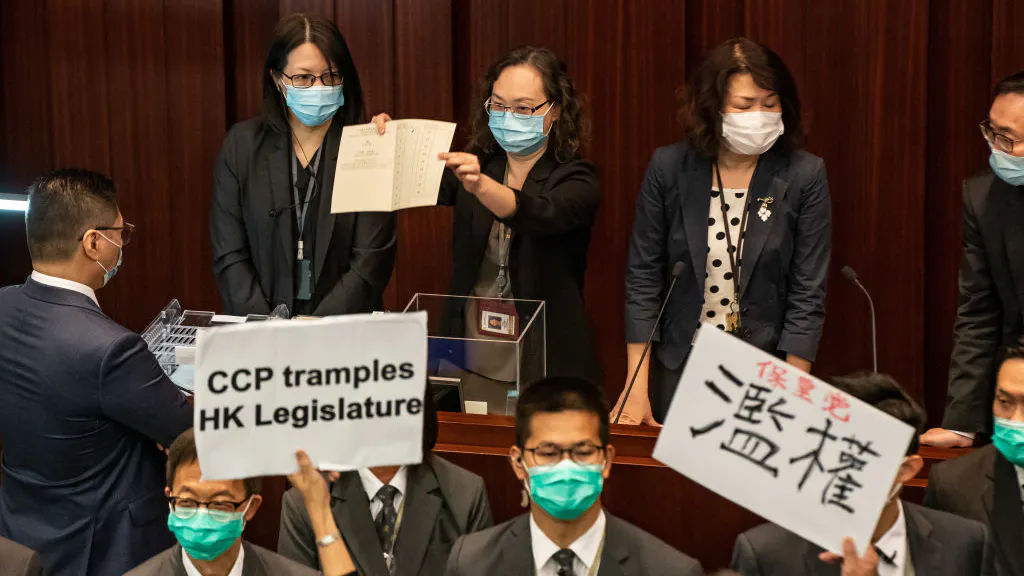 WATCH: Brawl Erupts In Hong Kong Parliament After Ouster Of Pro-Democracy Lawmaker