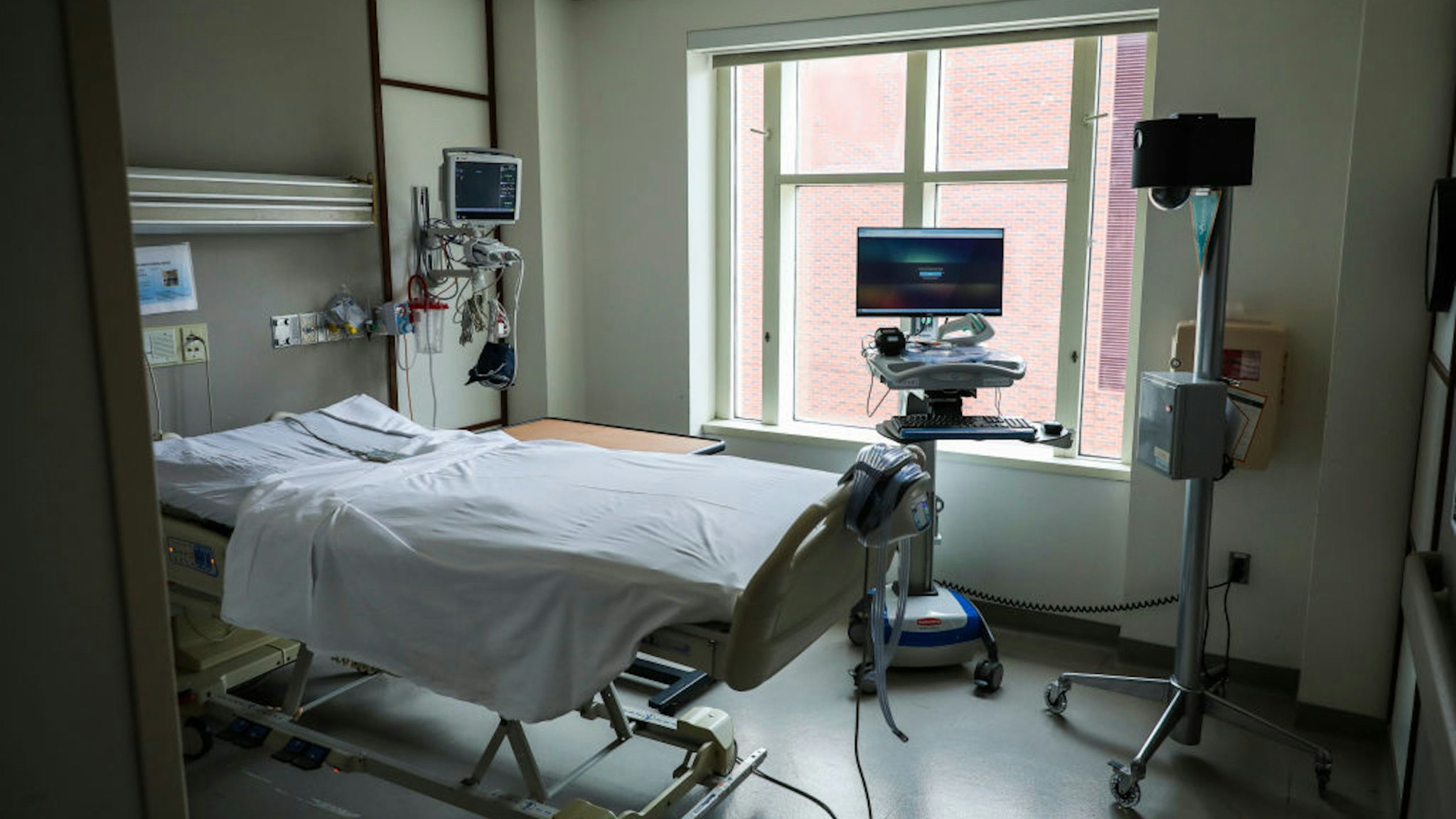 BOSTON, MA - APRIL 15: An empty room is set up and ready for a COVID-19 patient at Boston Medical Center in Boston on April 15, 2020. A camera is placed in the corner of the room to allow nurses and doctors to keep a close eye on the patient in case they roll off the bed or damage their tubes and wires. BMC has been hit hard by the coronavirus, reporting cases at the highest rate so far among major hospitals in the area, according to data tracked by the Globe.