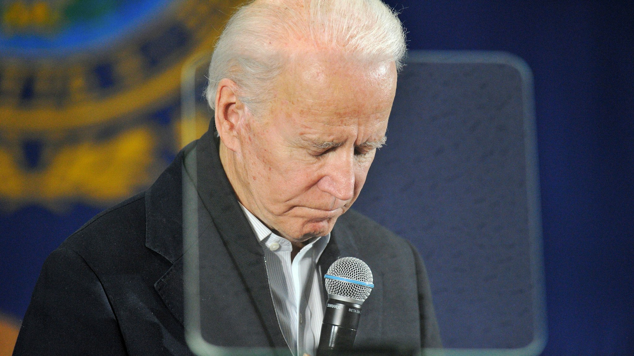 TOPSHOT - US Presidential candidate and former US Vice President Joe Biden gestures as he addresses supporters and curious voters at the IBEW Local 490 in Concord, New Hampshire on February 4, 2020. - Democratic White House candidate Pete Buttigieg seized a shock lead in the chaotic Iowa caucuses, closely trailed by leftist senator Bernie Sanders, according to partial returns released on Tuesday after an embarrassing delay in reporting the results. Progressive standard-bearer Elizabeth Warren was in third place followed by Joe Biden, a disappointing showing for the former vice president who has claimed he is best positioned to defeat Donald Trump in November.