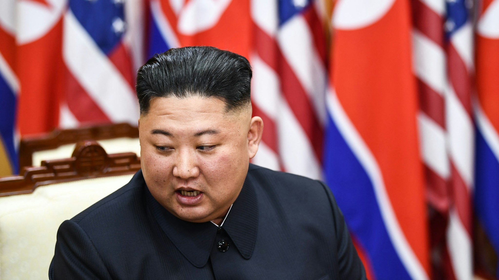 North Korea's leader Kim Jong Un attends a meeting with US President Donald Trump on the south side of the Military Demarcation Line that divides North and South Korea, in the Joint Security Area (JSA) of Panmunjom in the Demilitarized zone (DMZ) on June 30, 2019.
