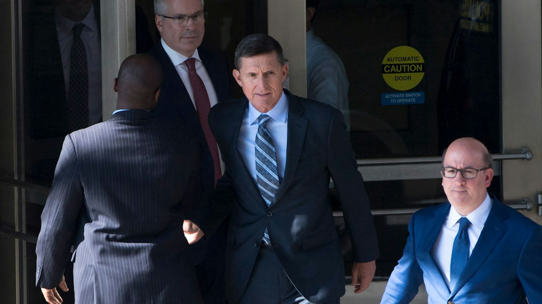 Donald Trump's former top advisor Michael Flynn pleaded guilty Friday to lying over his contacts with Russia, in a dramatic escalation of the FBI's probe into possible collusion between the Trump campaign and Moscow. The fourth, and most senior, figure indicted so far in the investigation into Russian interference in last year's election, Flynn appeared in federal court in Washington for a plea hearing less than two hours after the charges against him were made public. Ex-Trump aide Flynn says he recognizes his actions 'were wrong'. / AFP PHOTO / SAUL LOEB (Photo credit should read SAUL LOEB/AFP via Getty Images)