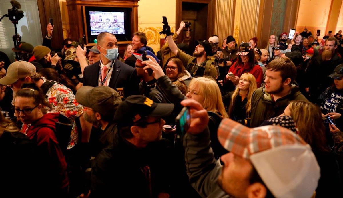 Watch Hundreds Of Protesters Some Armed Descend On Michigan Capitol Governor Extends Stay At 6801