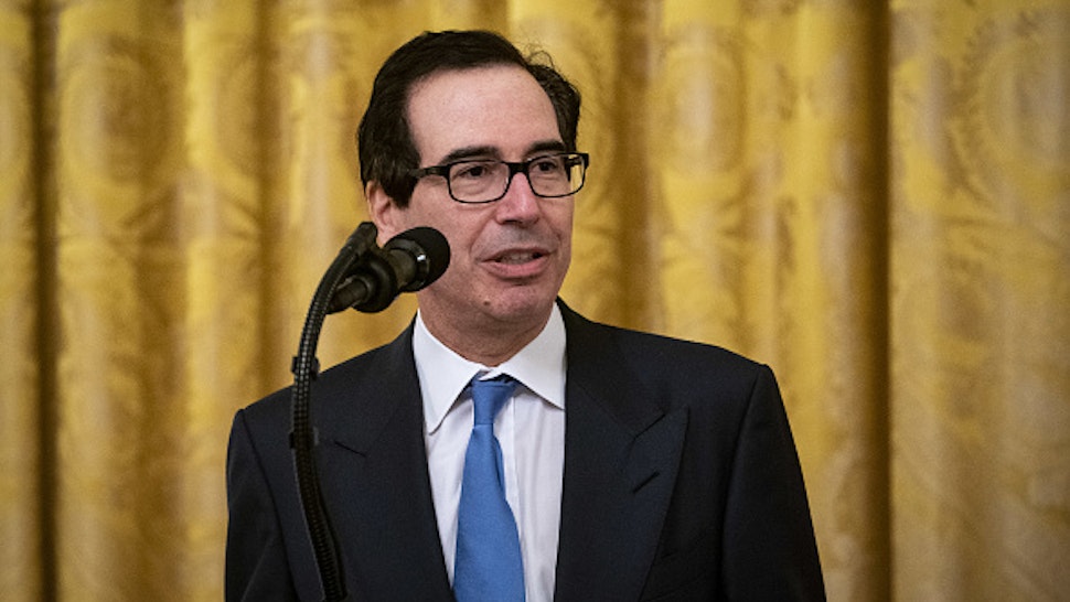 Steven Mnuchin, U.S. Treasury secretary, speaks during a Paycheck Protection Program (PPP) event in the East Room of the White House in Washington, D.C., U.S., on Tuesday, April 28, 2020. President Trump defended his early, dismissive response to the coronavirus outbreak, saying Tuesday that he was told late in February that it wouldn't be a problem.