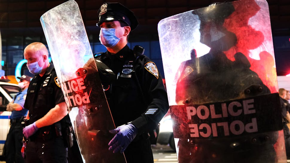 NEW YORK, NEW YORK - MAY 29: Police confront protesters in front of the Barclay's Center in Brooklyn on May 29, 2020 in New York City. Minneapolis Police officer Derek Chauvin was filmed kneeling on George Floyd's neck. Floyd was later pronounced dead at a local hospital. Across the country, protests against Floyd's death have set off days and nights of rage as its the most recent in a series of deaths of black Americans by the police.