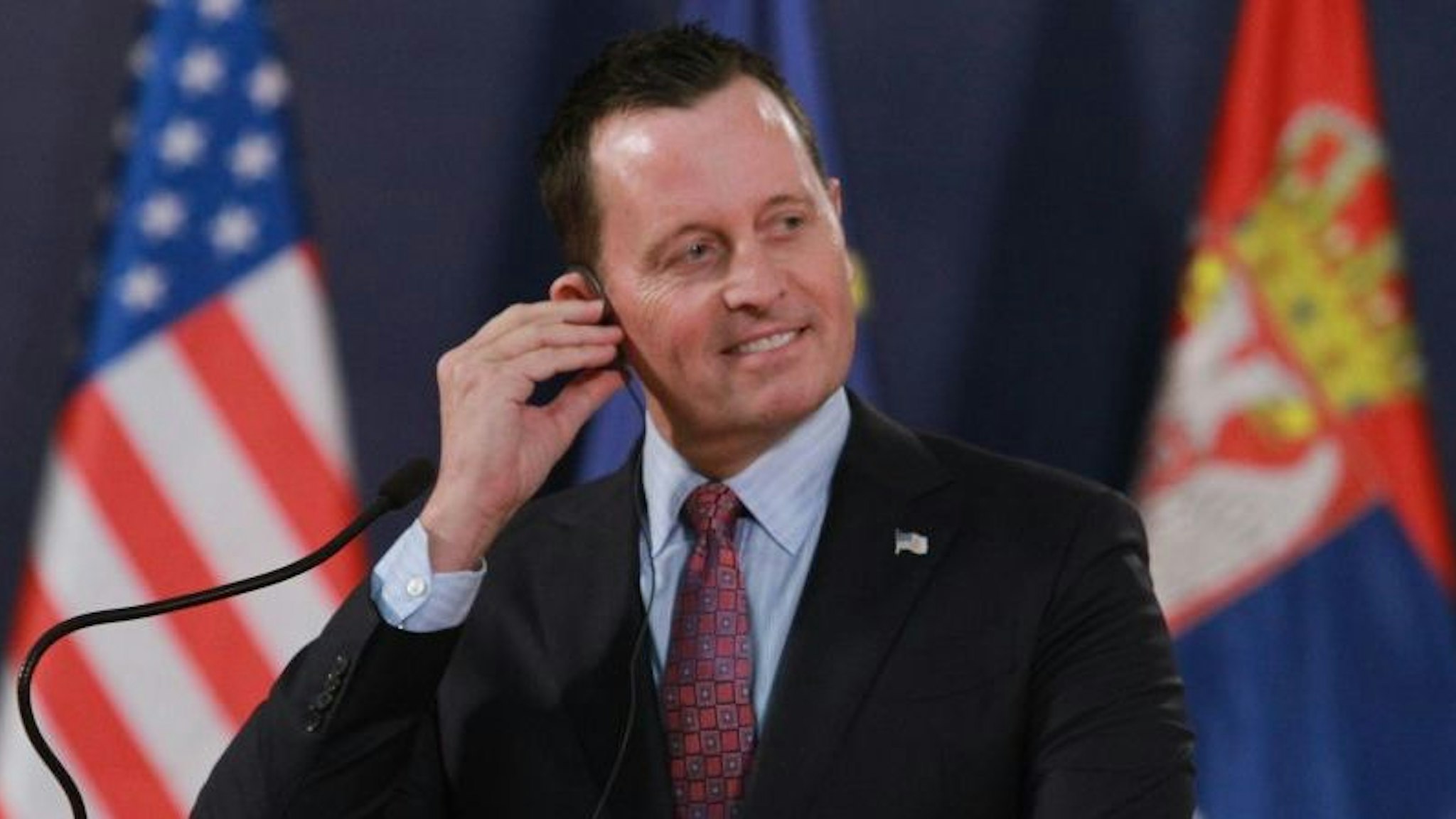 U.S. envoy for the Kosovo-Serbia dialogue, Richard Grenell listens during a joint press conference held with Serbian President Aleksandar Vucic (not seen) following their meeting in Belgrade, Serbia on January 24, 2020. (Photo by Milos Miskov/Anadolu Agency via Getty Images)