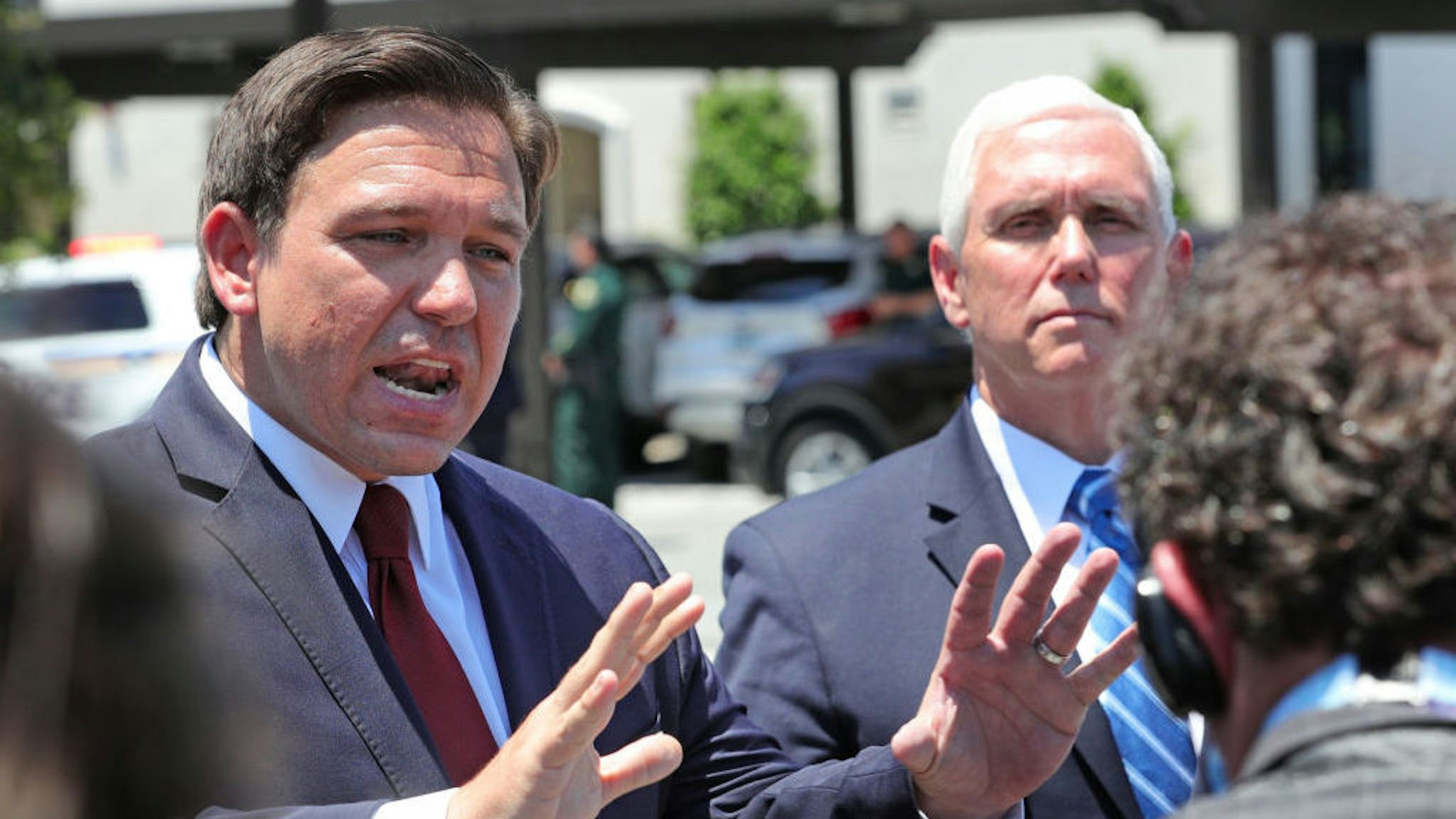 Florida governor Ron DeSantis answers reporters questions with Vice President Mike Pence at the Westminster Baldwin Park retirement community, in Orlando, Fla., Wednesday, May 20, 2020. Pence and DeSantis visited the facility to assist in delivering PPE supplies in response to the coronavirus crisis. (Joe Burbank/Orlando Sentinel/TNS)