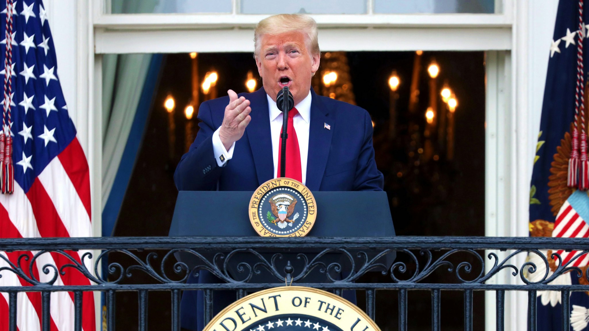 WASHINGTON, DC - MAY 22: U.S. President Donald Trump speaks from the Truman Balcony during a Rolling to Remember Ceremony: Honoring Our Nation’s Veterans and POW/MIA at the White House May 22, 2020 in Washington, DC. President Trump hosted the event to honor America’s veterans and fallen heroes.