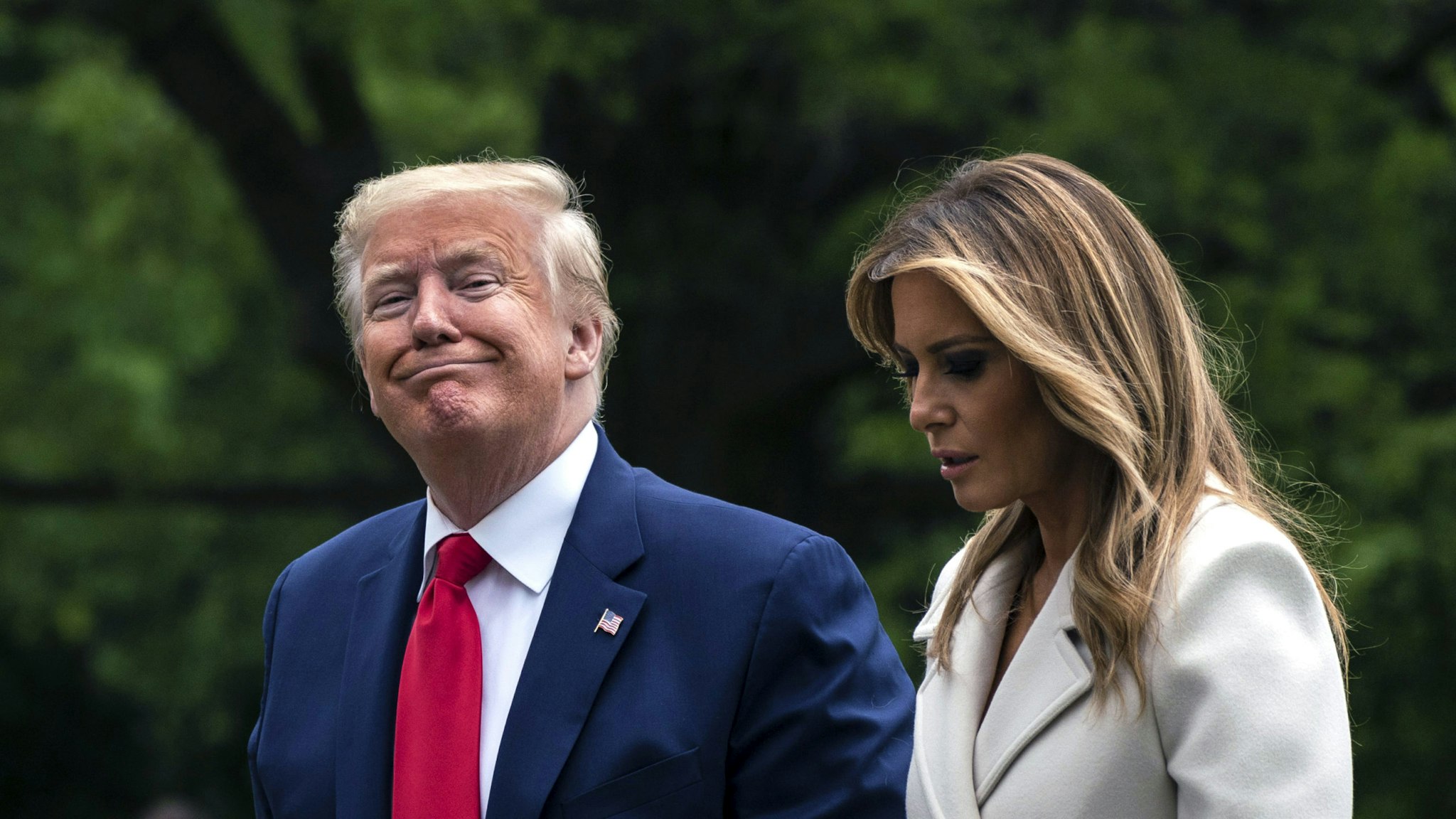 WASHINGTON, DC - MAY 25: U.S. President Donald Trump and first lady Melania Trump arrive to the South Lawn of the White House after a trip to Baltimore, Maryland on May 25, 2020 in Washington, DC. The Trumps attended a Memorial Day ceremony at the Fort McHenry National Monument and Historic Shrine despite objections by Baltimore Mayor Bernard C. Jack Young, whose residents remain under a stay-at-home order due to the coronavirus.