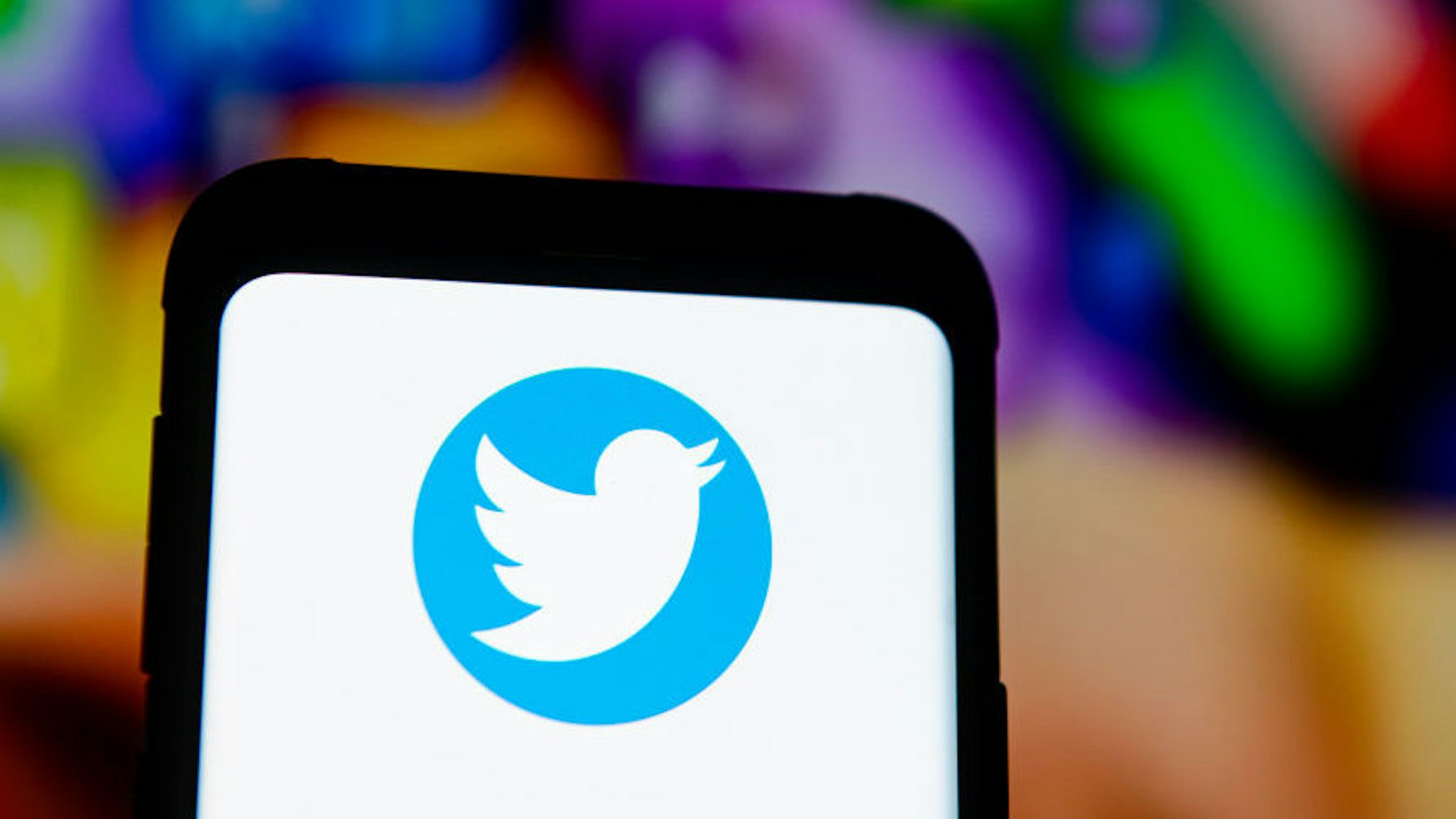 In this photo illustration a Twitter logo seen displayed on a smartphone. (Photo Illustration by Mateusz Slodkowski/SOPA Images/LightRocket via Getty Images)