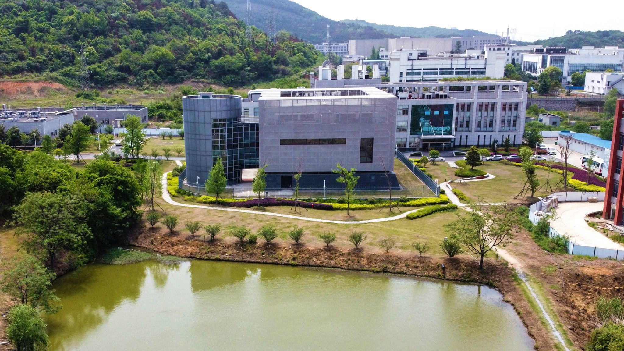 An aerial view shows the P4 laboratory (C) at the Wuhan Institute of Virology in Wuhan in China's central Hubei province on April 17, 2020. - The P4 epidemiological laboratory was built in co-operation with French bio-industrial firm Institut Merieux and the Chinese Academy of Sciences. The facility is among a handful of labs around the world cleared to handle Class 4 pathogens (P4) - dangerous viruses that pose a high risk of person-to-person transmission.