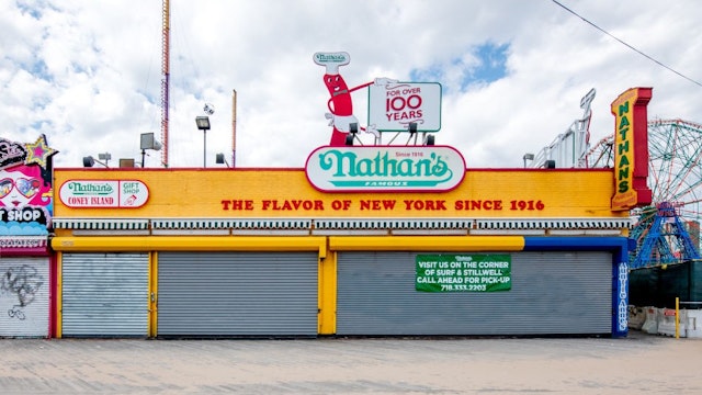 NEW YORK, NEW YORK - MAY 04: The Nathan's Famous beach storefront at Riegelmann Boardwalk in Coney Island is closed during the coronavirus pandemic on May 04, 2020 in New York City. COVID-19 has spread to most countries around the world, claiming over 252,000 lives with over 3.6 million infections reported. (Photo by