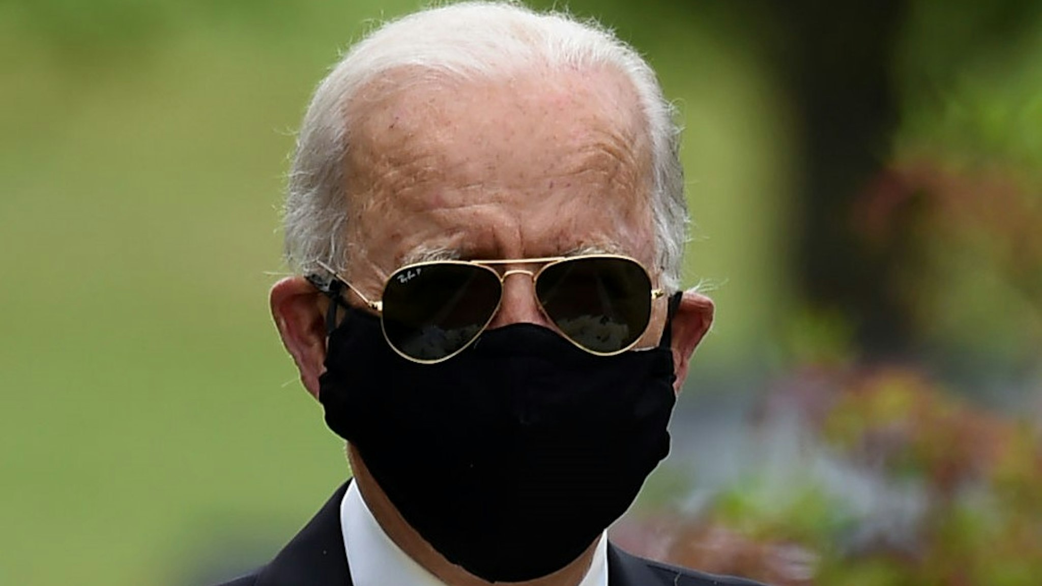 TOPSHOT - Democratic presidential candidate and former US Vice President Joe Biden arrives to pay his respects to fallen service members on Memorial Day at Delaware Memorial Bridge Veteran's Memorial Park in Newcastle, Delaware, May 25, 2020. (Photo by Olivier DOULIERY / AFP) (Photo by