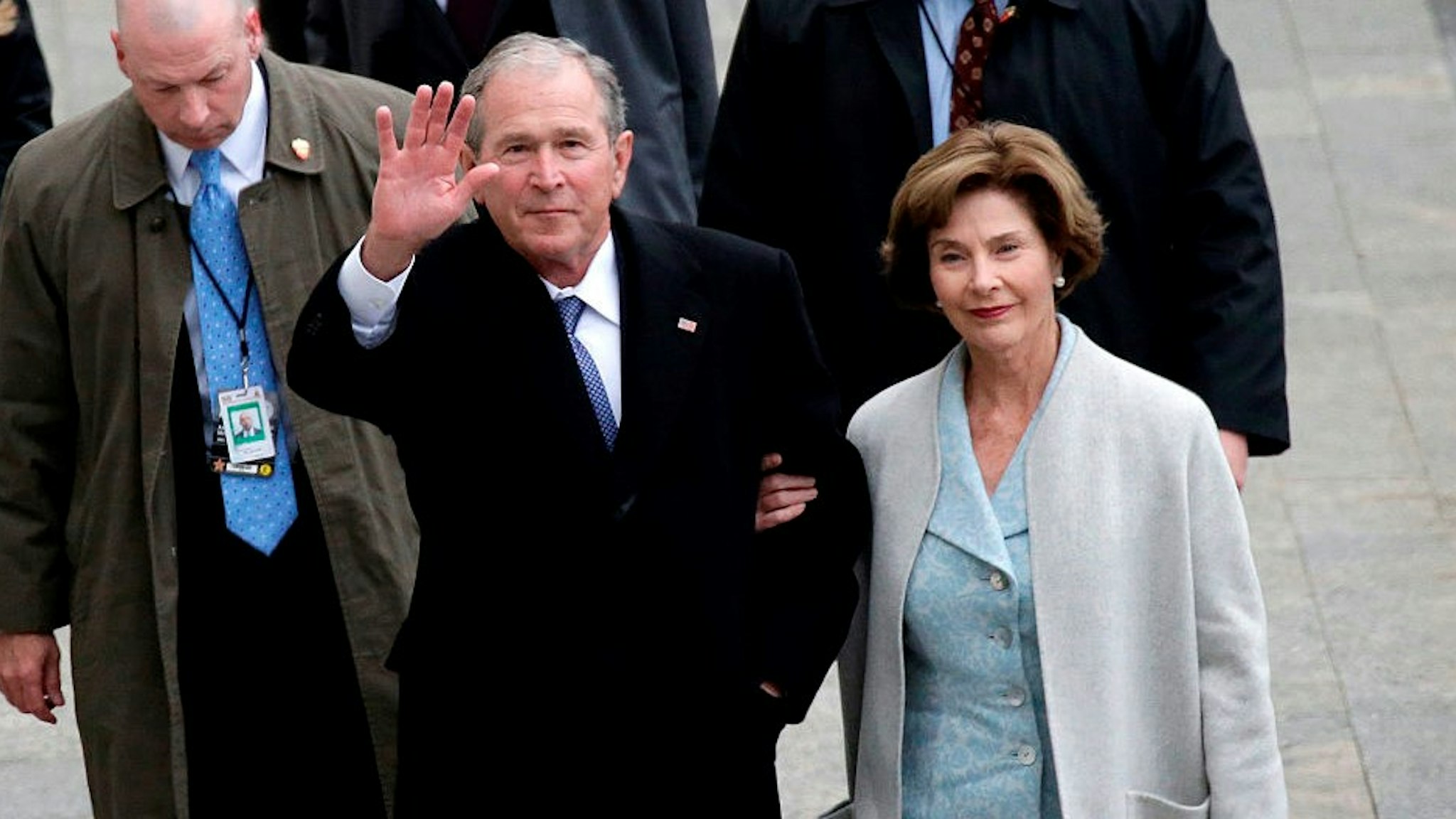 WASHINGTON, DC - JANUARY 20: Former U.S. President of the United States George W. Bush and wife Laura Bush arrive near the east front steps of the Capitol Building before President-elect Donald Trump is sworn in at the 58th Presidential Inauguration on Capitol Hill on January 20, 2017 in Washington, D.C. In today's inauguration ceremony Donald J. Trump becomes the 45th president of the United States. (Photo by