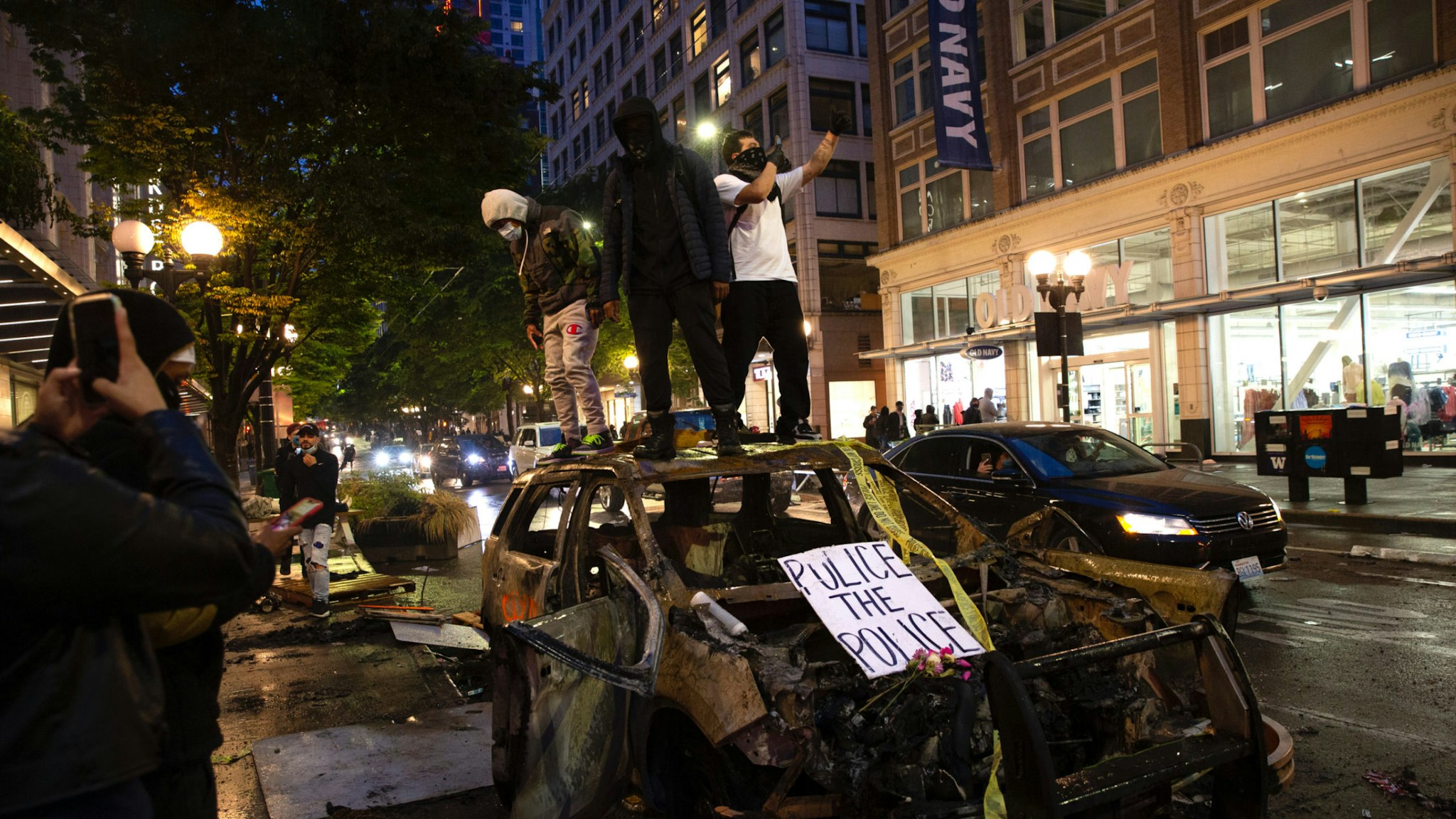 Protesters riot in the streets following a peaceful rally expressing outrage over the death of George Floyd on May 30, 2020 in Seattle, Washington.