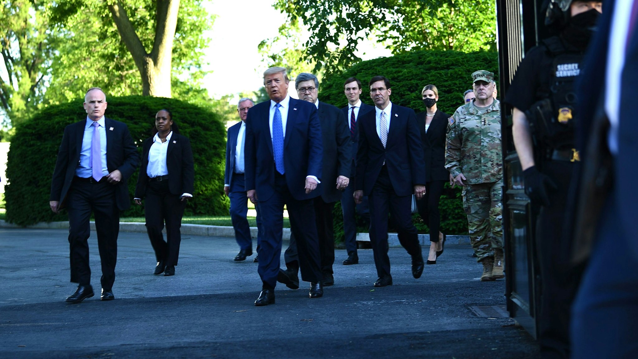US President Donald Trump leaves the White House on foot to go to St John's Episcopal church across Lafayette Park in Washington, DC on June 1, 2020. - US President Donald Trump was due to make a televised address to the nation on Monday after days of anti-racism protests against police brutality that have erupted into violence. The White House announced that the president would make remarks imminently after he has been criticized for not publicly addressing in the crisis in recent days.