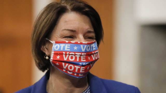 Senator Amy Klobuchar, a Democrat from Minnesota, wears a protective mask while arriving to a Senate Judiciary Committee executive business meeting in Washington, D.C., U.S., on Thursday, June 11, 2020. The committee is scheduled to authorize subpoenas of numerous former Obama-era officials while reviewing the origins of the investigation into Russian election interference and the Trump campaign's role. Photographer: Carolyn Kaster/AP Photo/Bloomberg via Getty Images