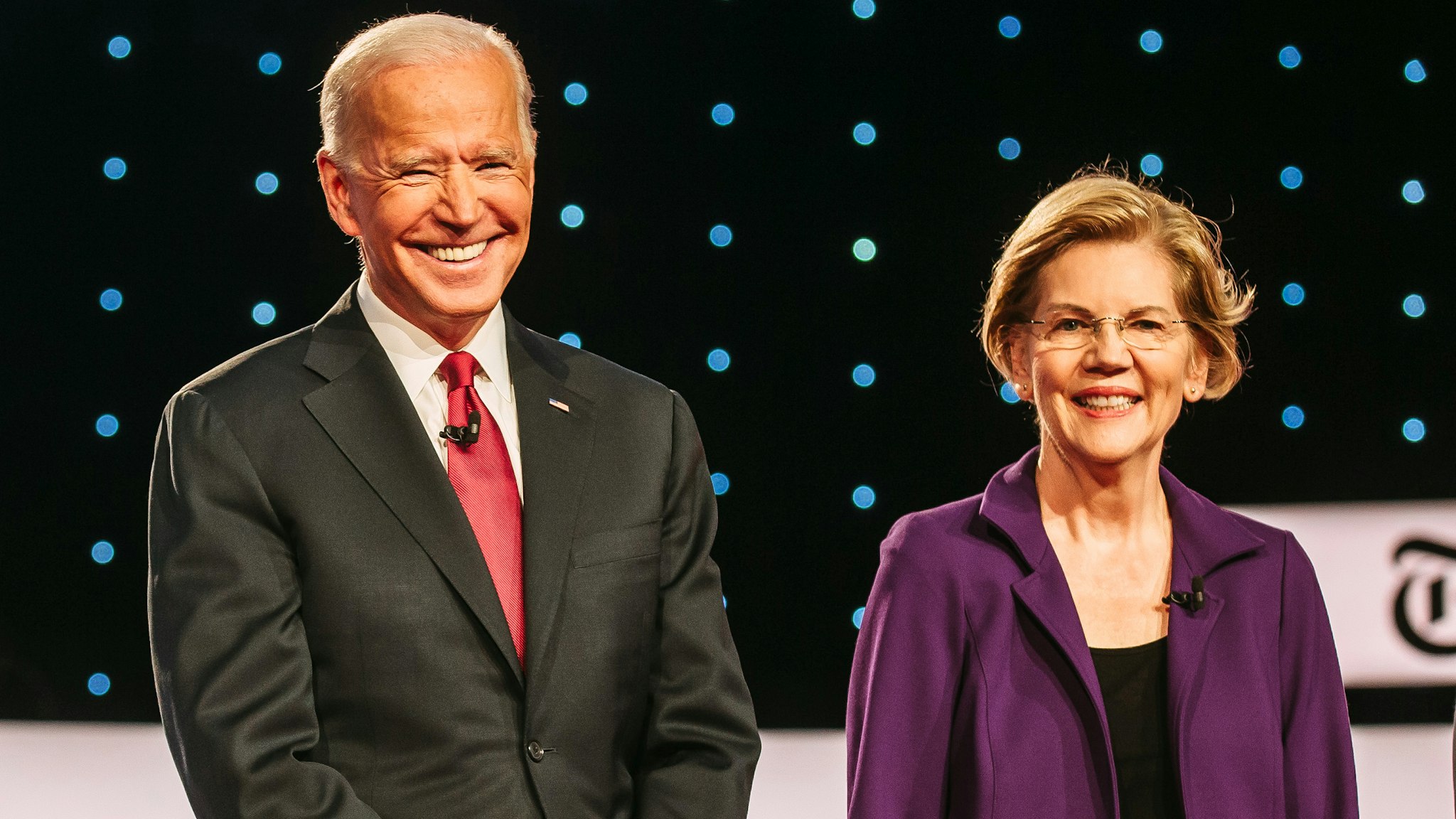 2020 Democratic presidential candidates Senator Bernie Sanders, an independent from Vermont, from left, former U.S. Vice President Joe Biden, and Senator Elizabeth Warren, a Democrat from Massachusetts, arrive on stage for the Democratic presidential candidate debate in Westerville, Ohio, U.S., on Tuesday, Oct. 15, 2019. The candidates meet for the fourth debate after an extraordinary series of events that has dramatically altered the race since the last forum in September.