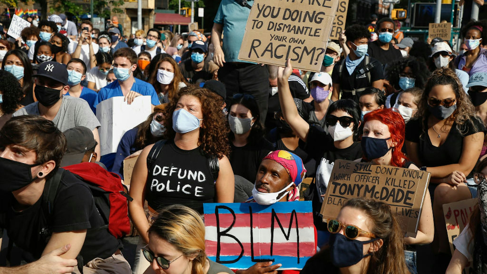 NEW YORK, UNITED STATES - 2020/06/15: Protesters hold placards during the demonstration. Protests continue against police brutality and racial injustice in New York City. (Photo by John Lamparski/SOPA Images/LightRocket via Getty Images)