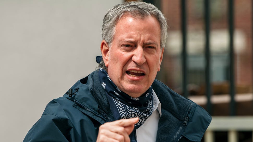NEW YORK, NY - APRIL 14: New York City Mayor Bill de Blasio speaks at a food shelf organized by The Campaign Against Hunger in Bed Stuy, Brooklyn on April 14, 2020 in New York City. Before touring the facility de Blasio praised the work of food shelves and community organizations across New York City to combat hunger during the ongoing coronavirus crisis.