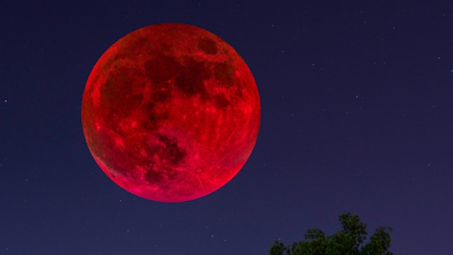 Blood moon on night sky