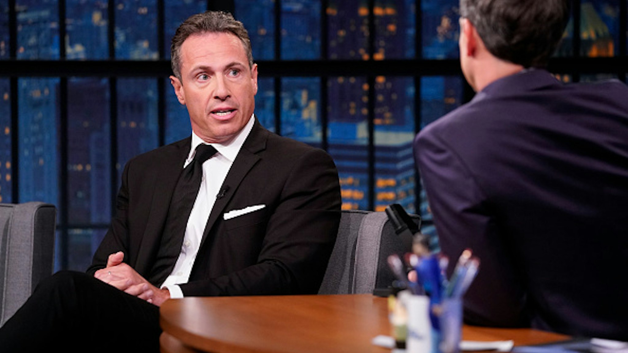 LATE NIGHT WITH SETH MEYERS -- Episode 867 -- Pictured: (l-r) CNN's Chris Cuomo during an interview with host Seth Meyers on August 1, 2019 --