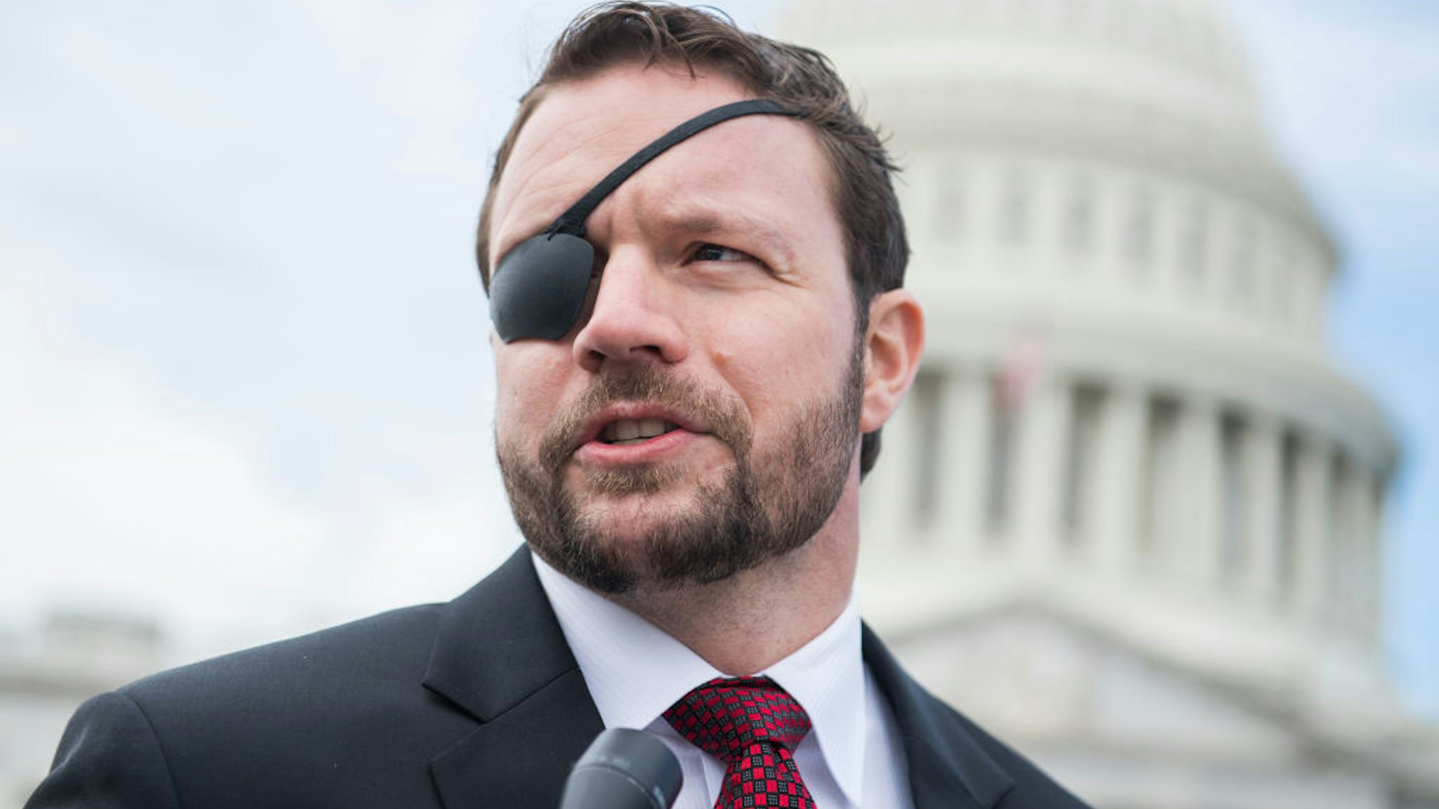 UNITED STATES - NOVEMBER 14: Rep.-elect Dan Crenshaw, R-Texas, is seen after the freshman class photo on the East Front of the Capitol on November 14, 2018. (Photo By Tom Williams/CQ Roll Call)