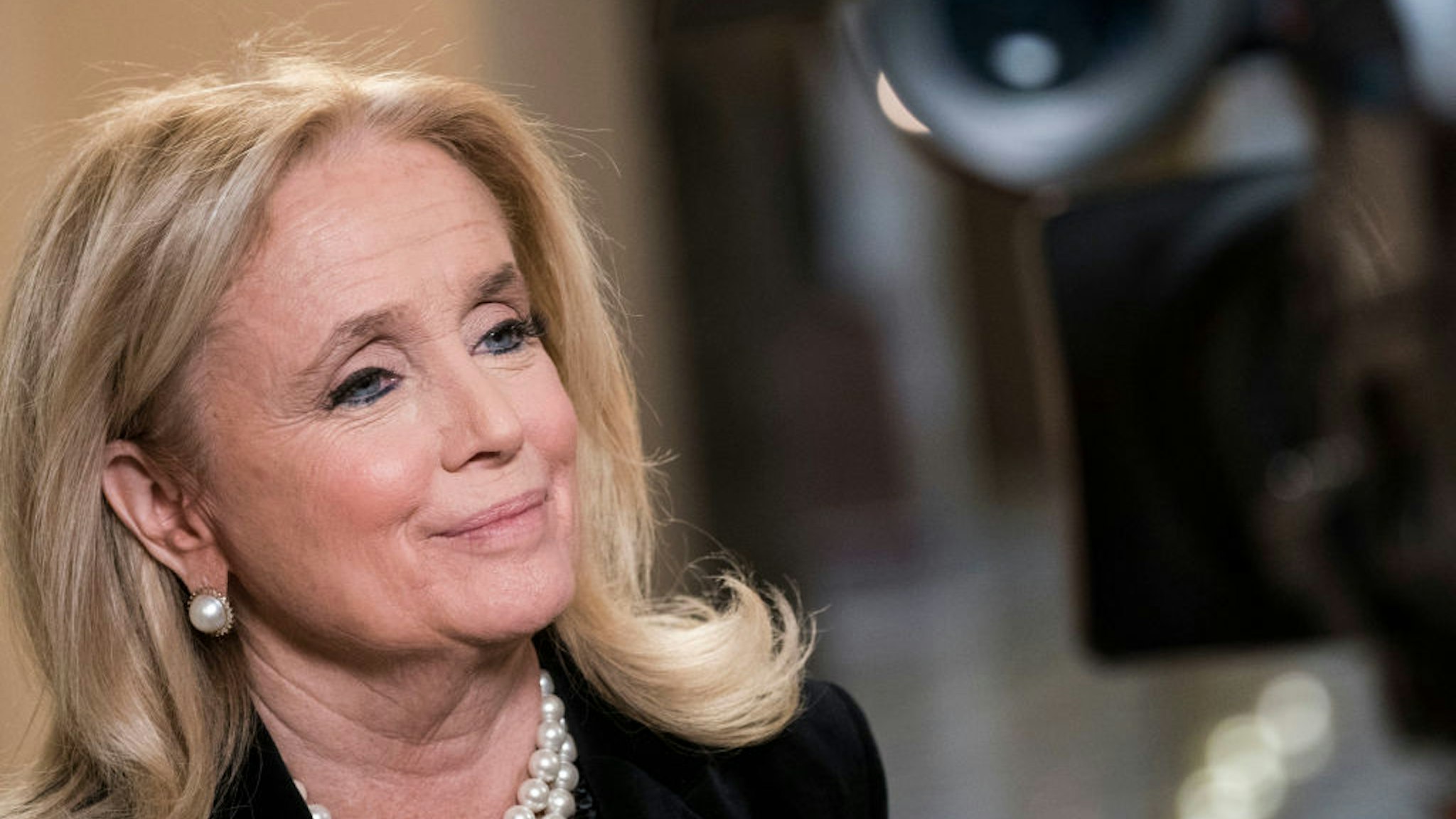 Rep. Debbie Dingell (D-MI) speaks with MSNBC to discuss U.S. President Donald Trump's comments about her late husband, former Rep. John Dingell (D-MI), at the U.S. Capitol on December 19, 2019 in Washington, DC. President Trump suggested Dingell was "looking up" from hell during a campaign rally in Michigan on Wednesday. (Photo by Sarah Silbiger/Getty Images)